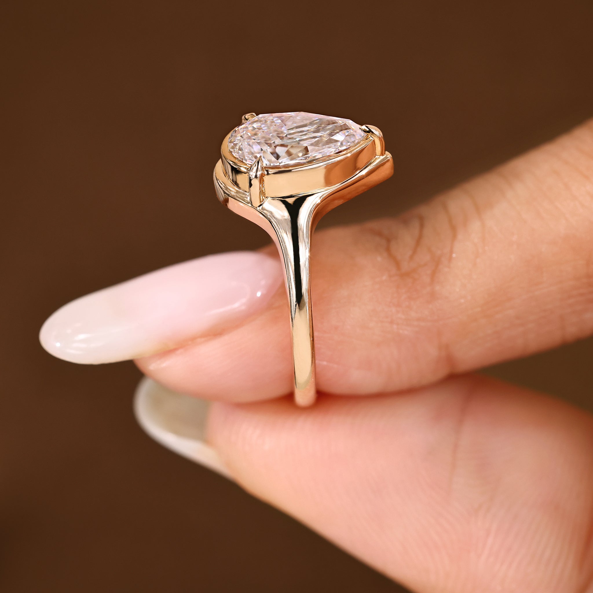 Handmade pear cut diamond ring with IGI certified stone.
