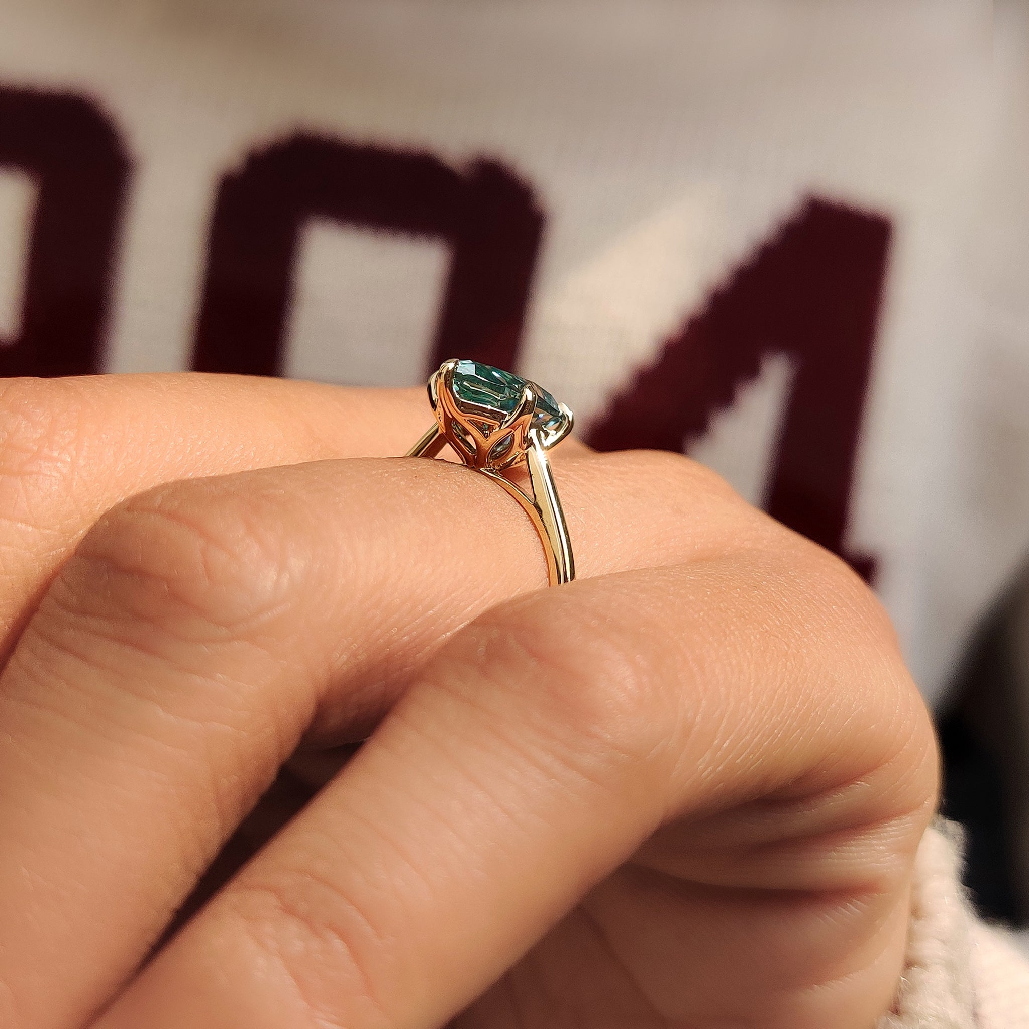 Pear cut moissanite ring tulip basket style.
