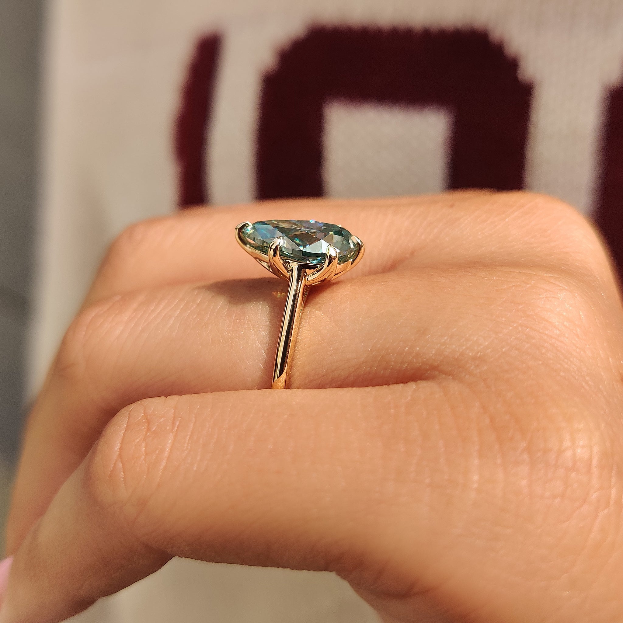 Handmade pear moissanite ring cyan blue style.
