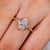 Pear diamond ring with vintage style and milgrain details
