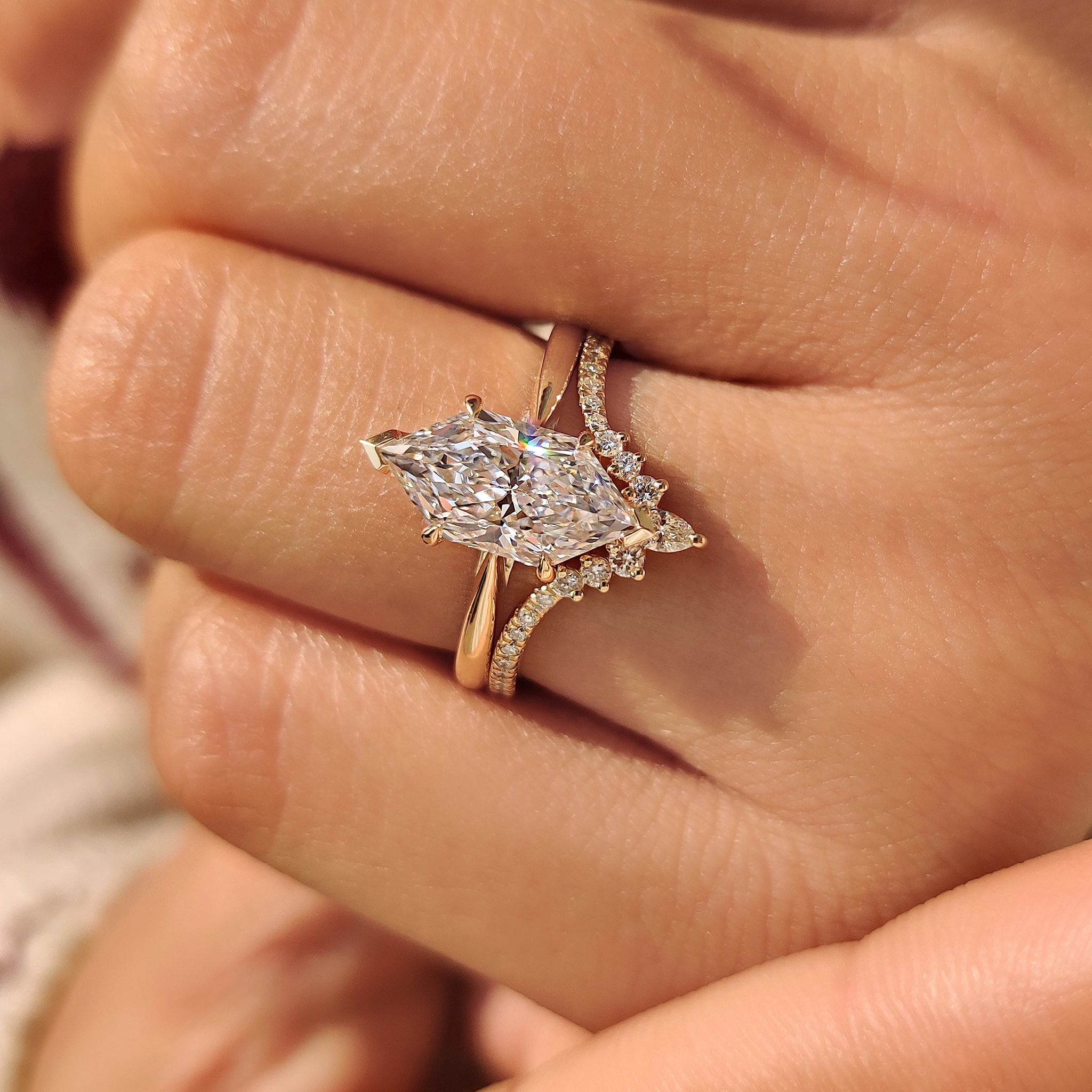 Solitaire ring with wedding band in cathedral setting
