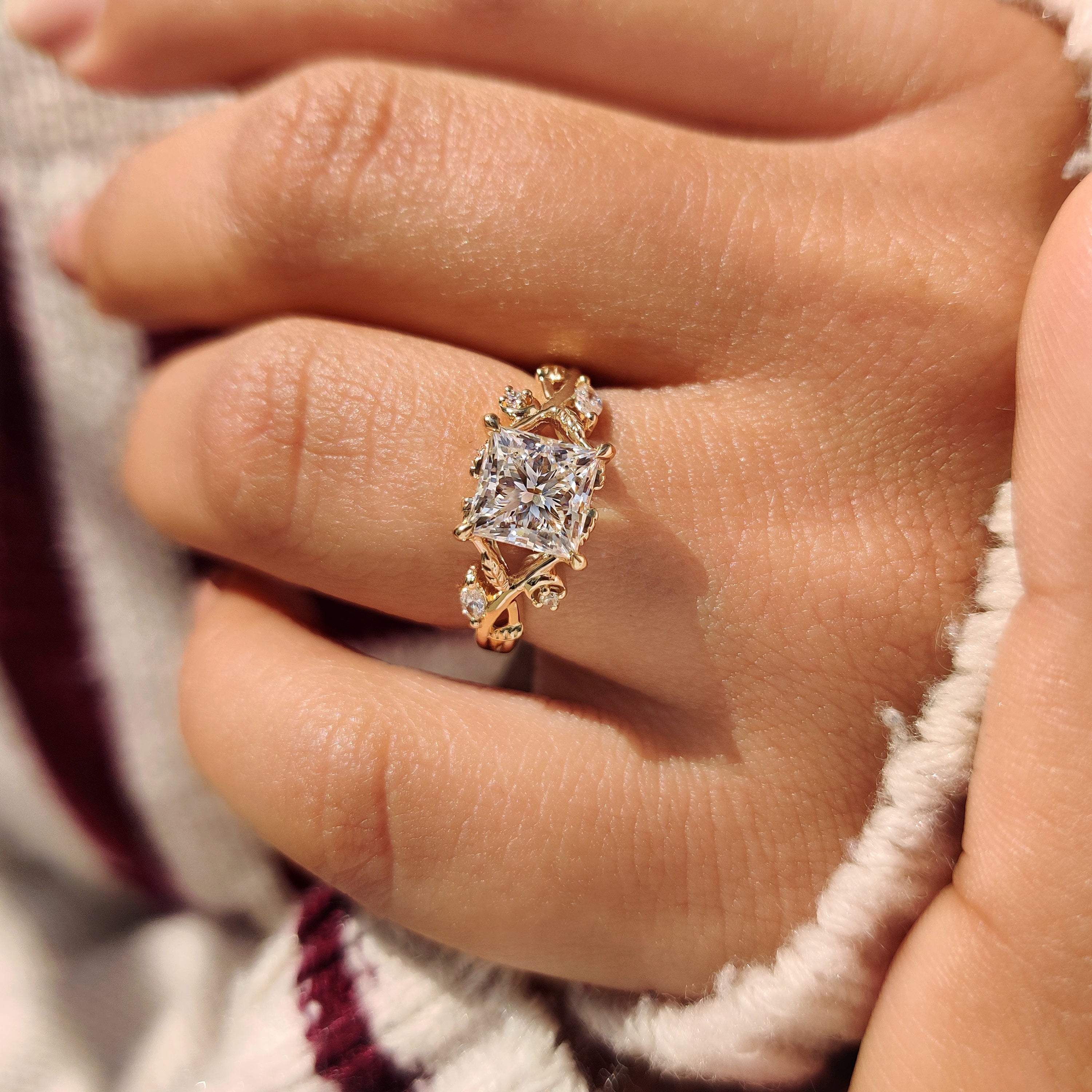 Nature style princess ring with marquise and round accents.

