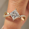 Princess cut diamond ring with round diamond twisted pave style
