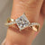 Princess cut diamond ring with round diamond twisted pave style

