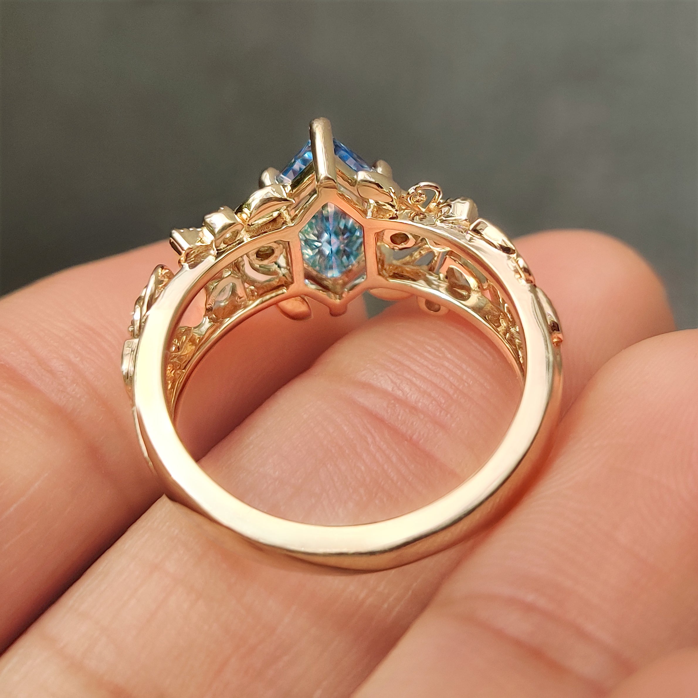 Four claw prong Dutch marquise engagement ring
