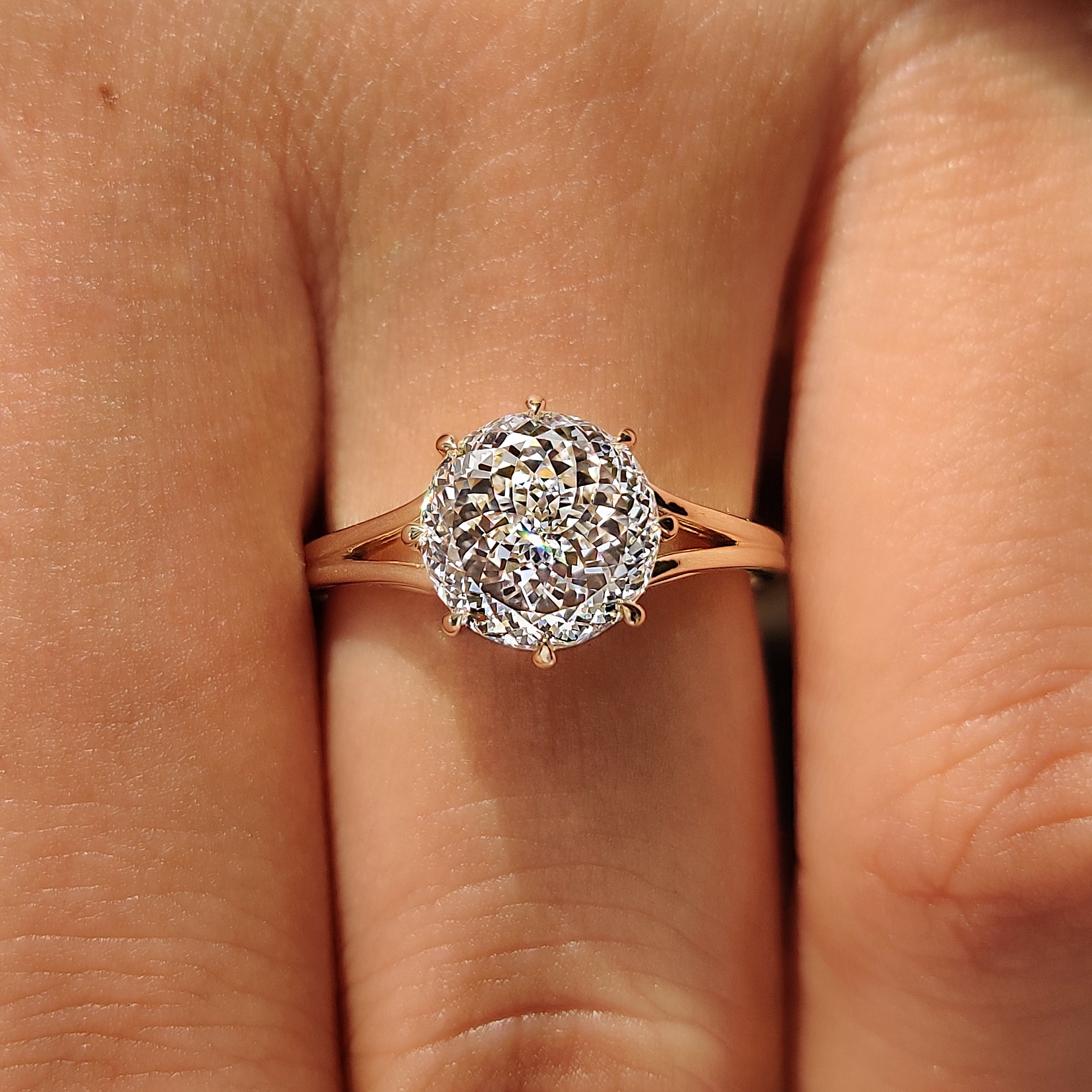  Portuguese cut diamond solitaire engagement ring.