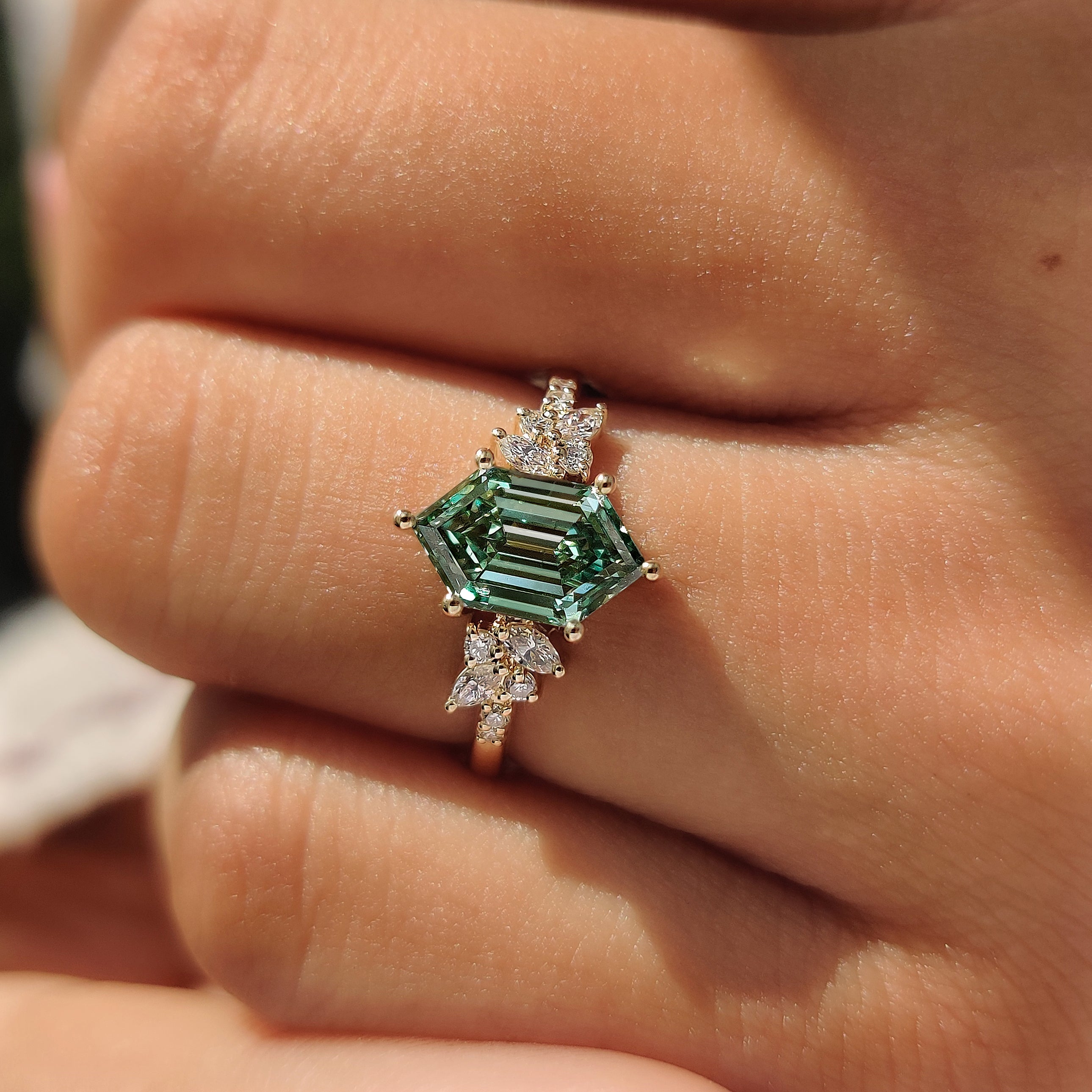 Green Hexagon Step Cut Ring with Marquise and Round Cluster Setting