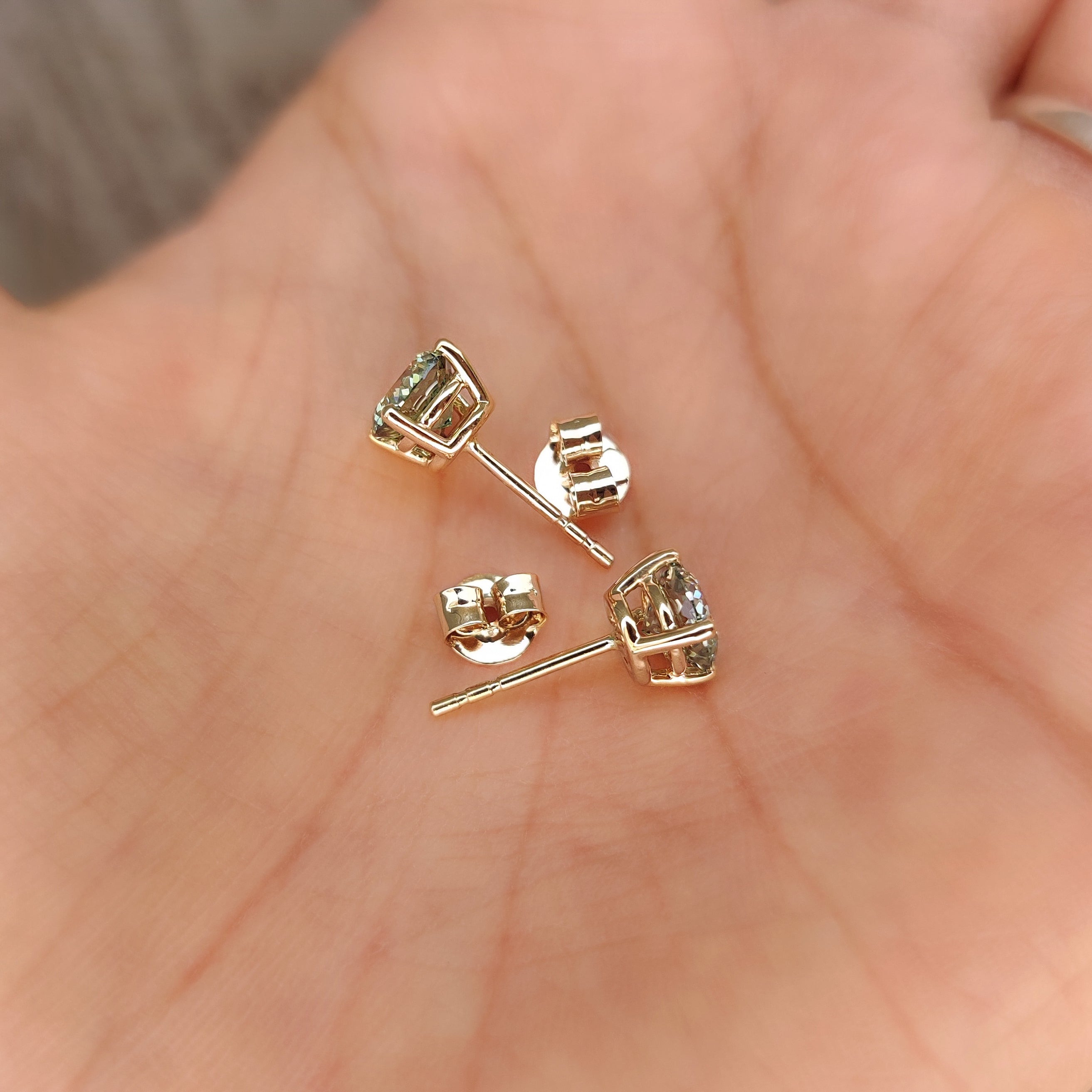 Handmade stud earrings with green lab grown diamonds setting
