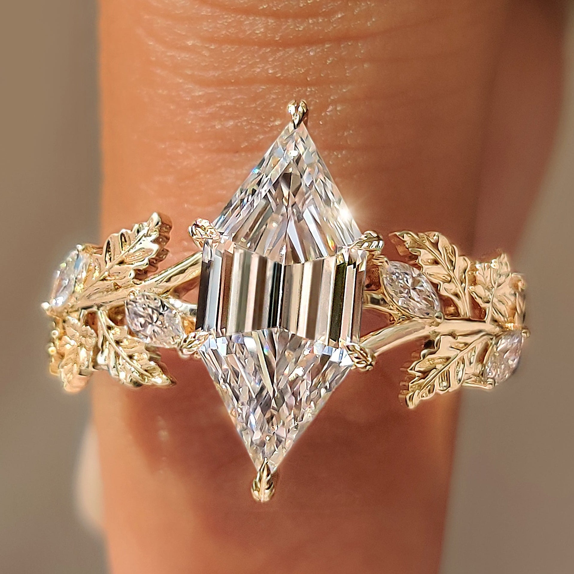 Hexagon step cut diamond autumn oak and maple leaf ring.