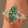 Green marquise diamond solitaire ring with tulip setting