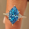 Blue Dutch marquise diamond cluster ring in yellow gold.
