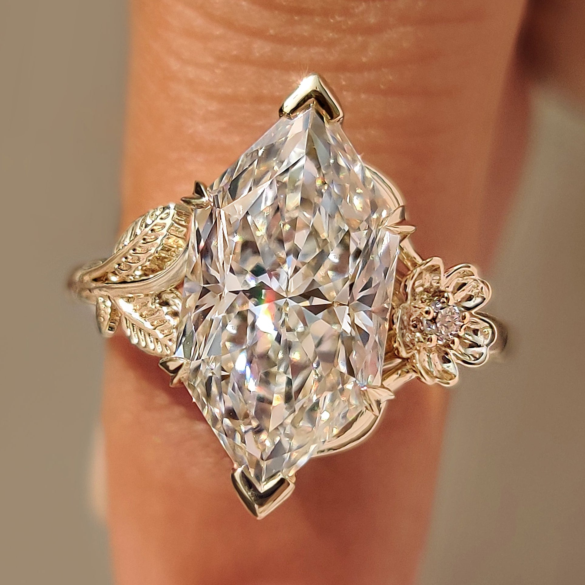 Dutch marquise diamond ring with nature inspired floral design.