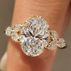 Oval ring with marquise and round diamond muse setting
