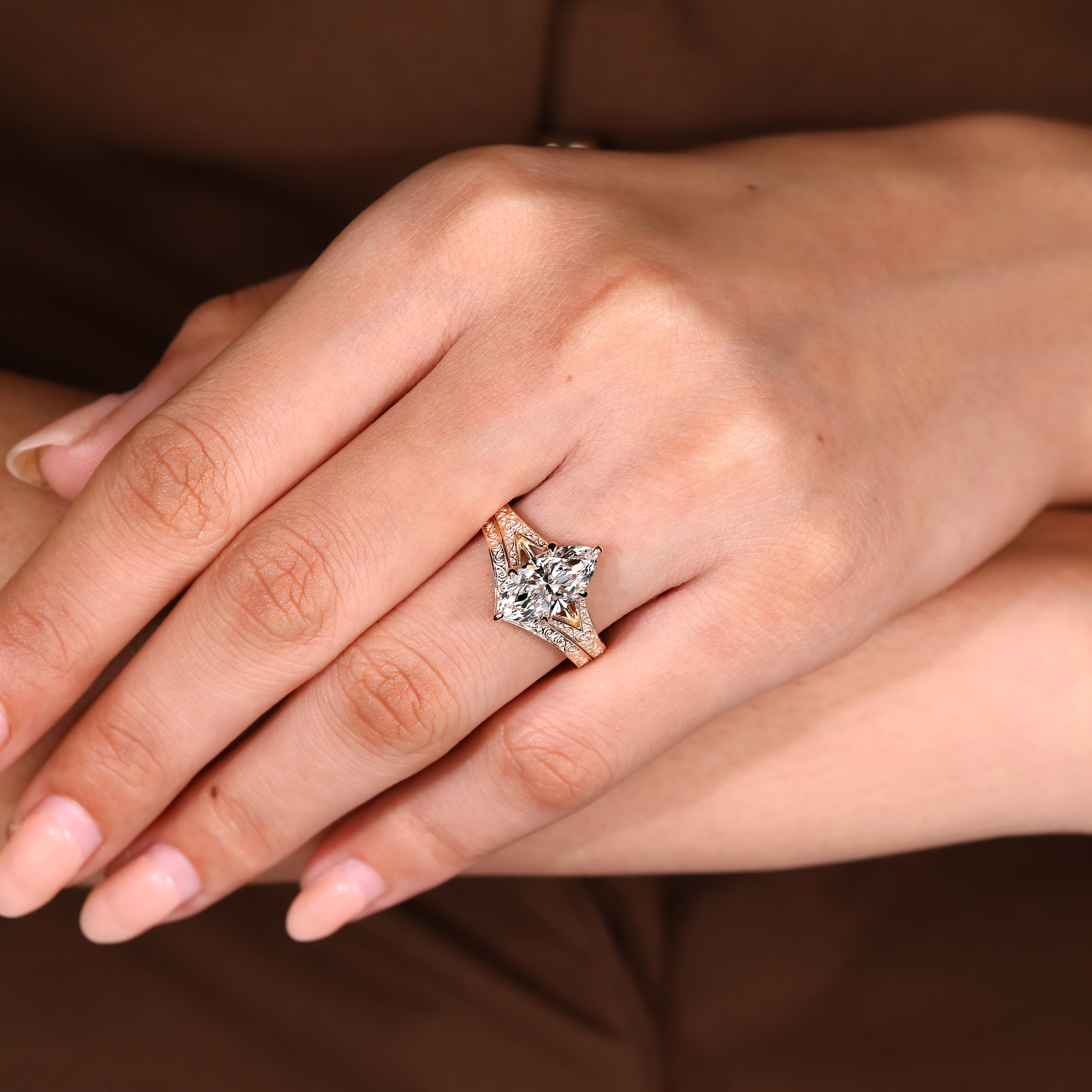Marquise bridal set featuring a solitaire center stone and vintage-style wedding band

