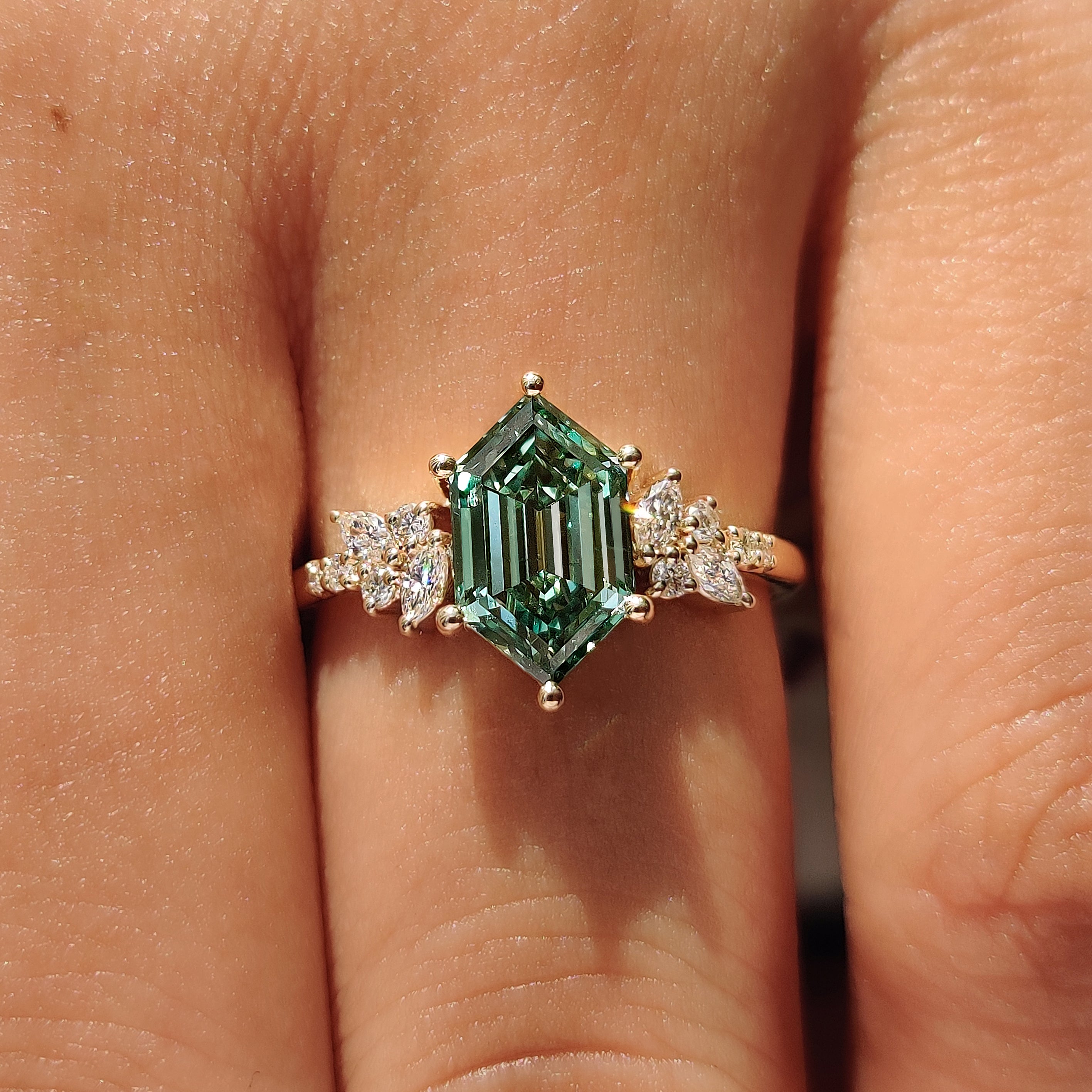 Green Hexagon Step Cut Ring with Marquise and Round Cluster Setting