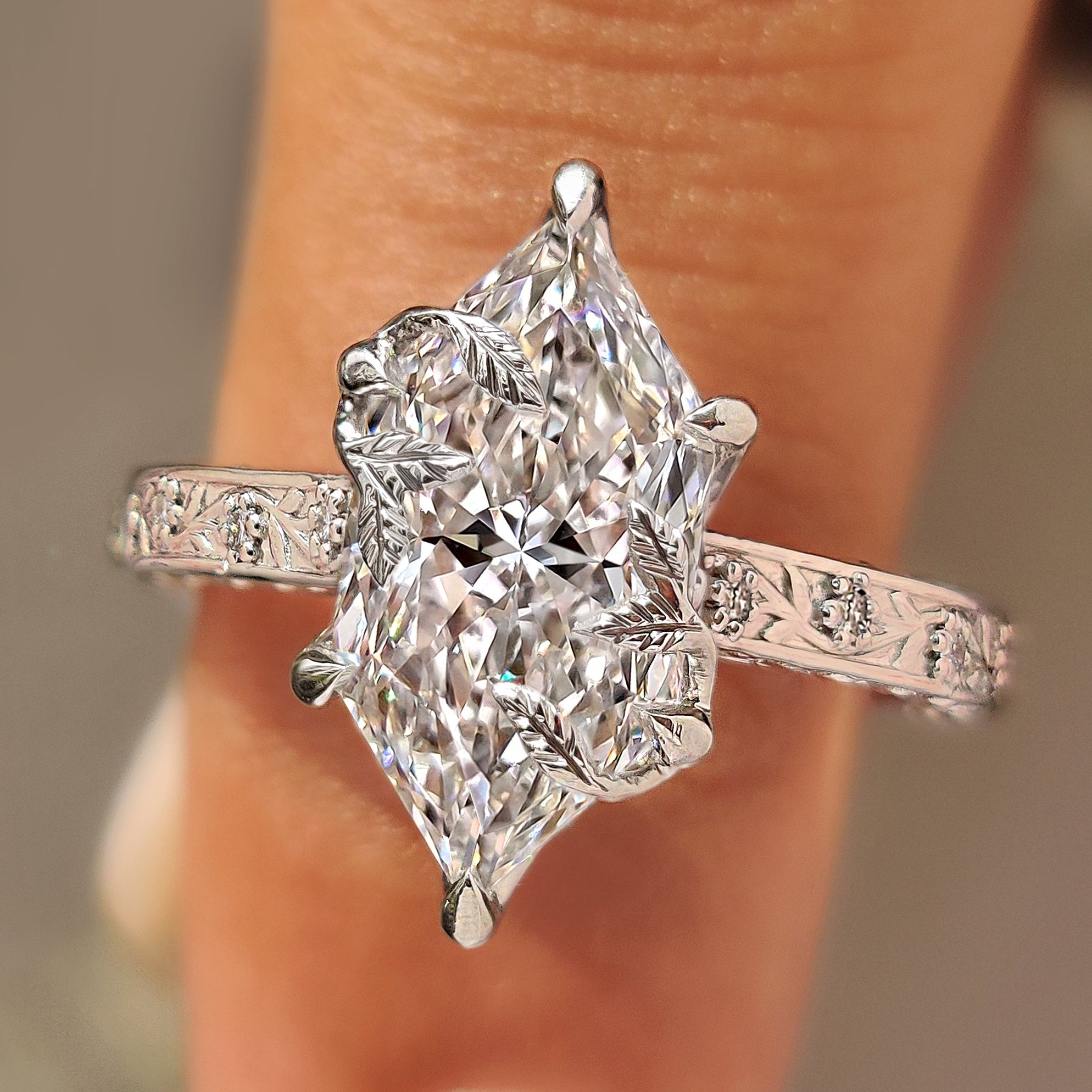 Vintage Dutch marquise ring with hand engraved floral shank.
