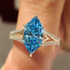Dutch marquise diamond ring with blue center diamond
