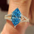 Dutch marquise diamond ring with blue center diamond
