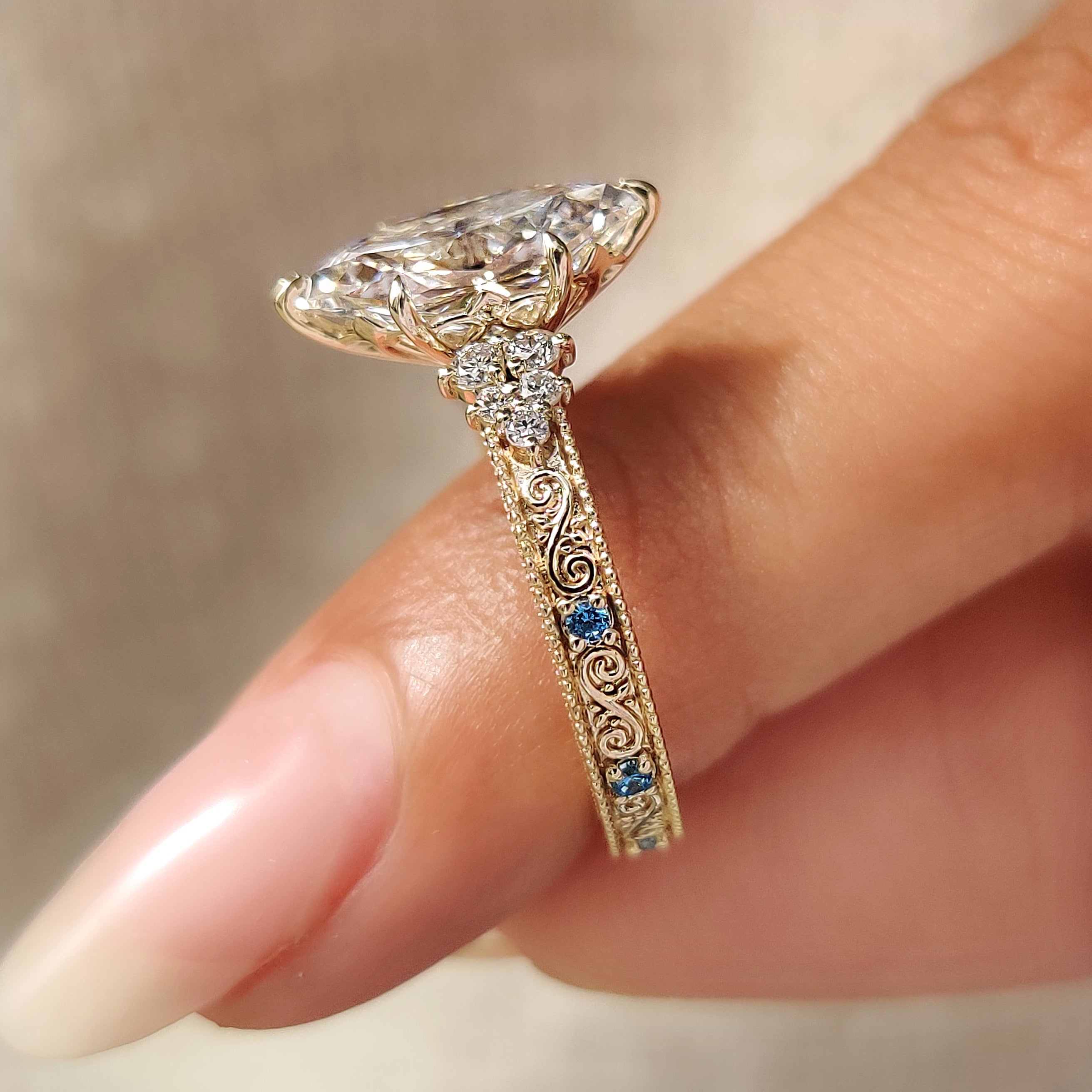 Milgrain Dutch marquise engagement ring with engraved shank

