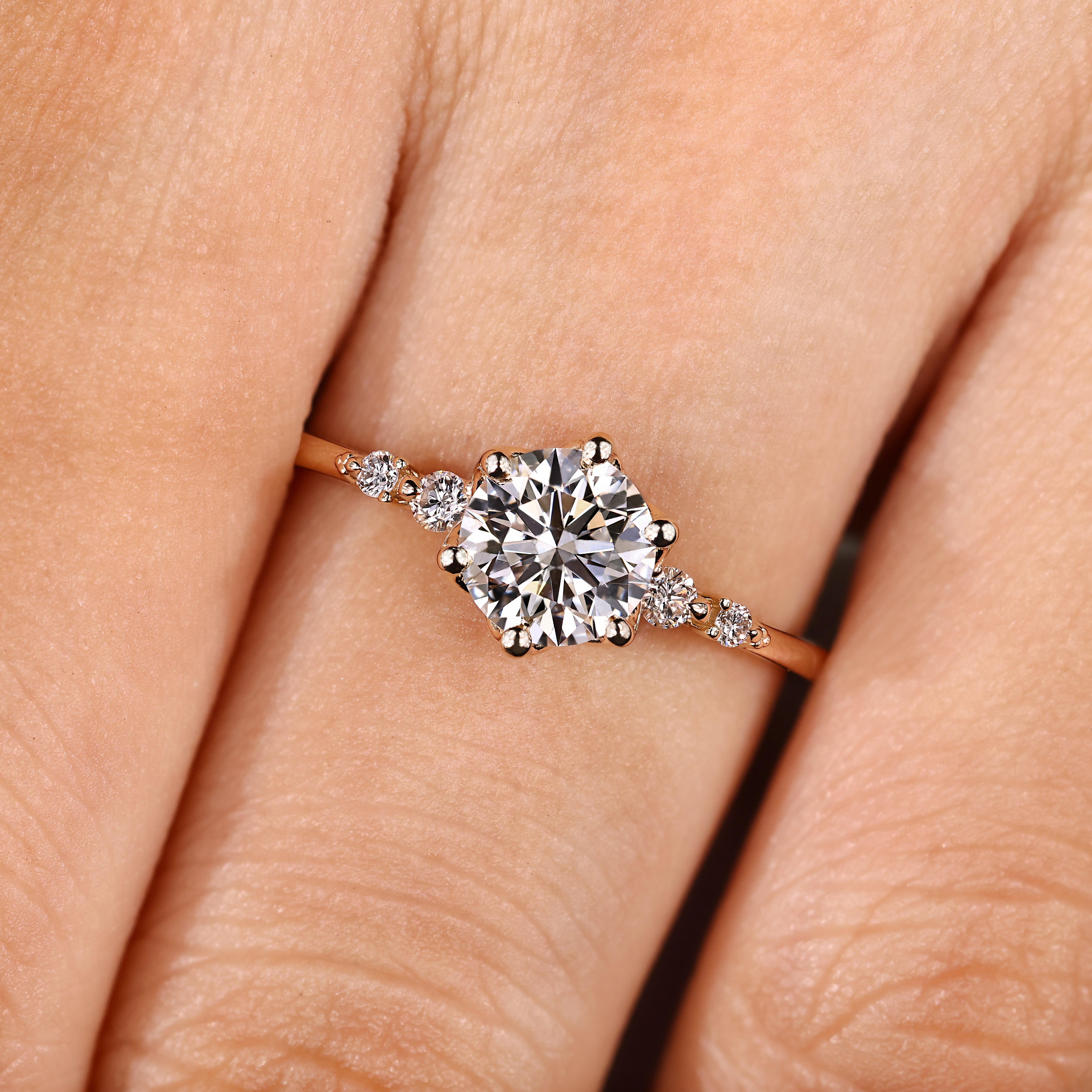 Round diamond engagement ring with tulip and six prongs
