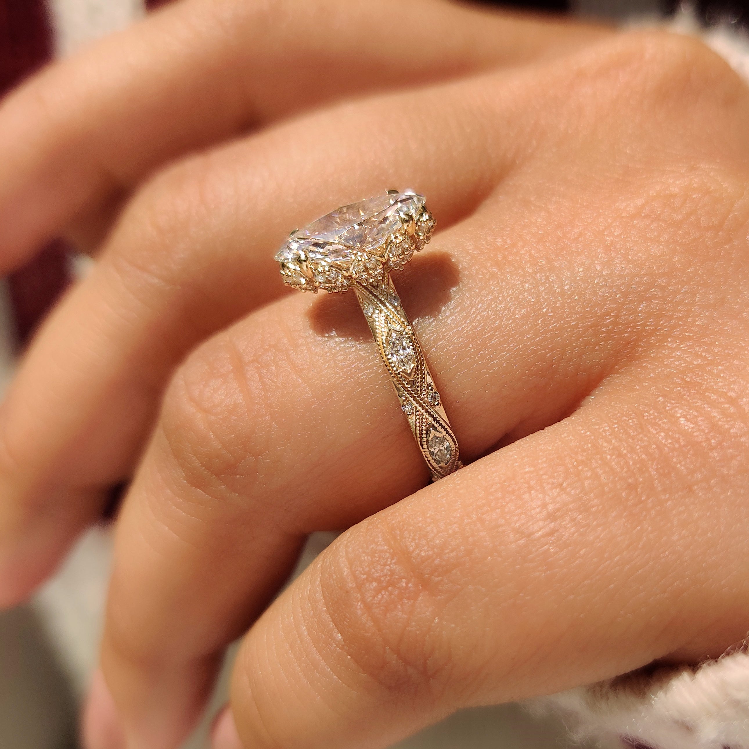 Handmade marquise diamond ring with hidden flower crown.
