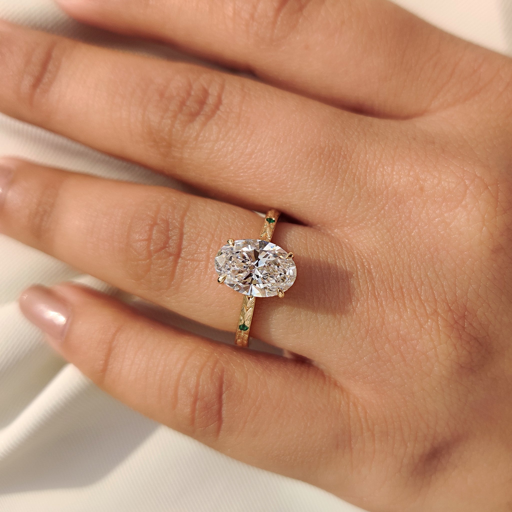 Carat Diamonds handmade Art Deco oval diamond ring.