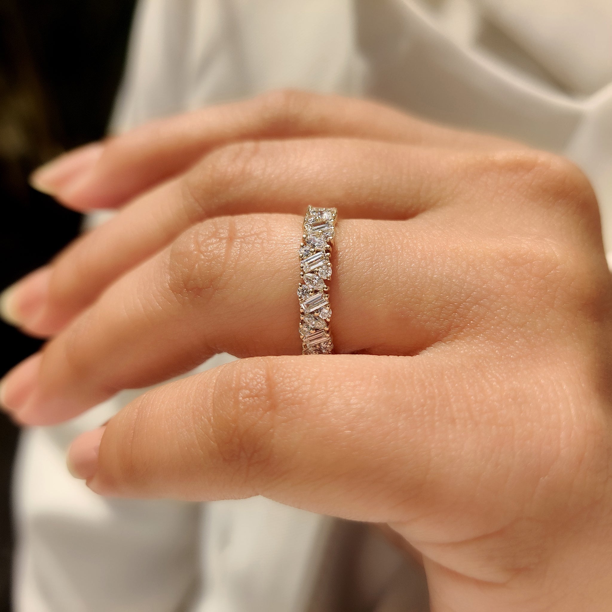 Handmade diamond band with round marquise baguette stones.
