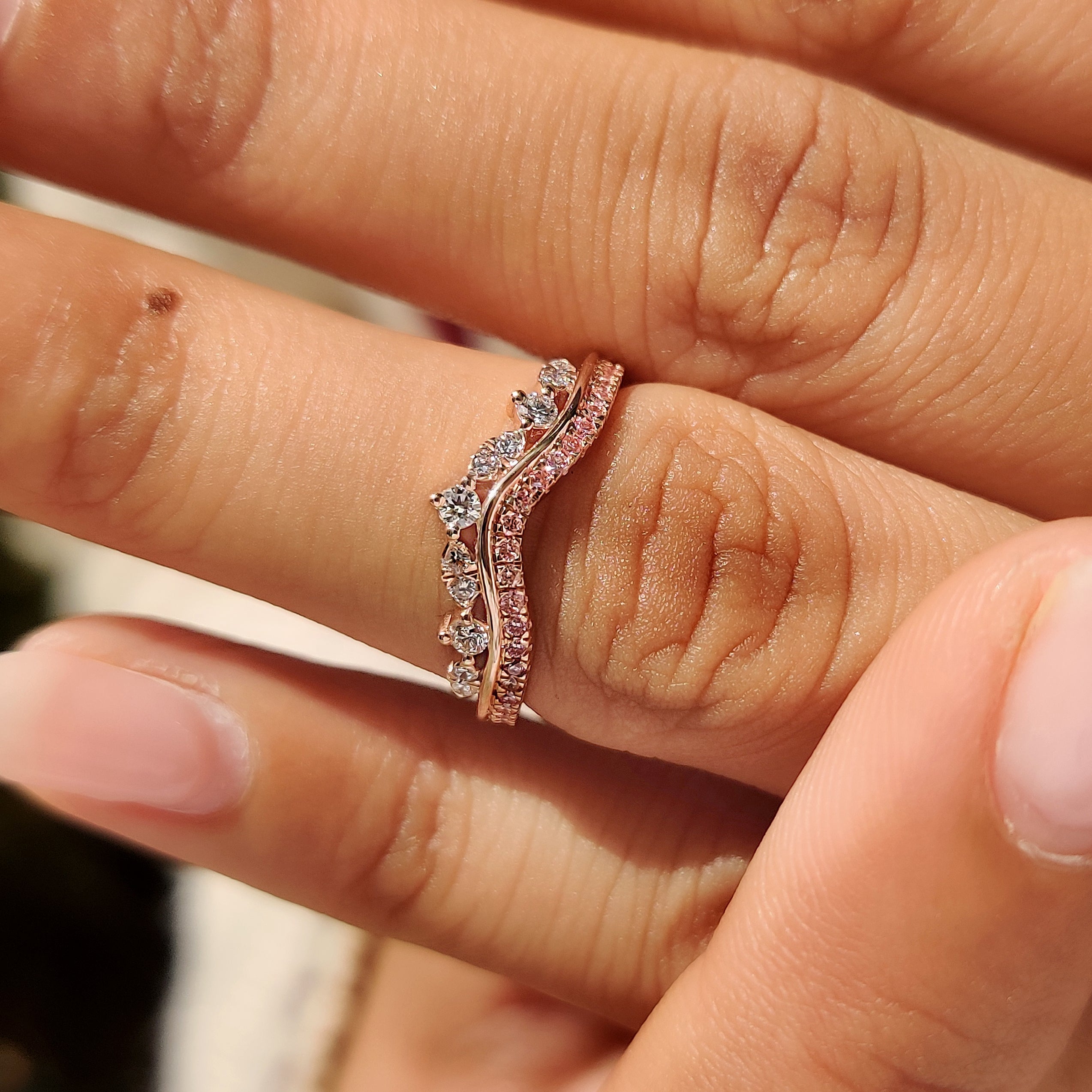 Tiara style wedding band with shared prong diamond setting
