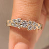 Round diamond band with scattered cluster setting.
