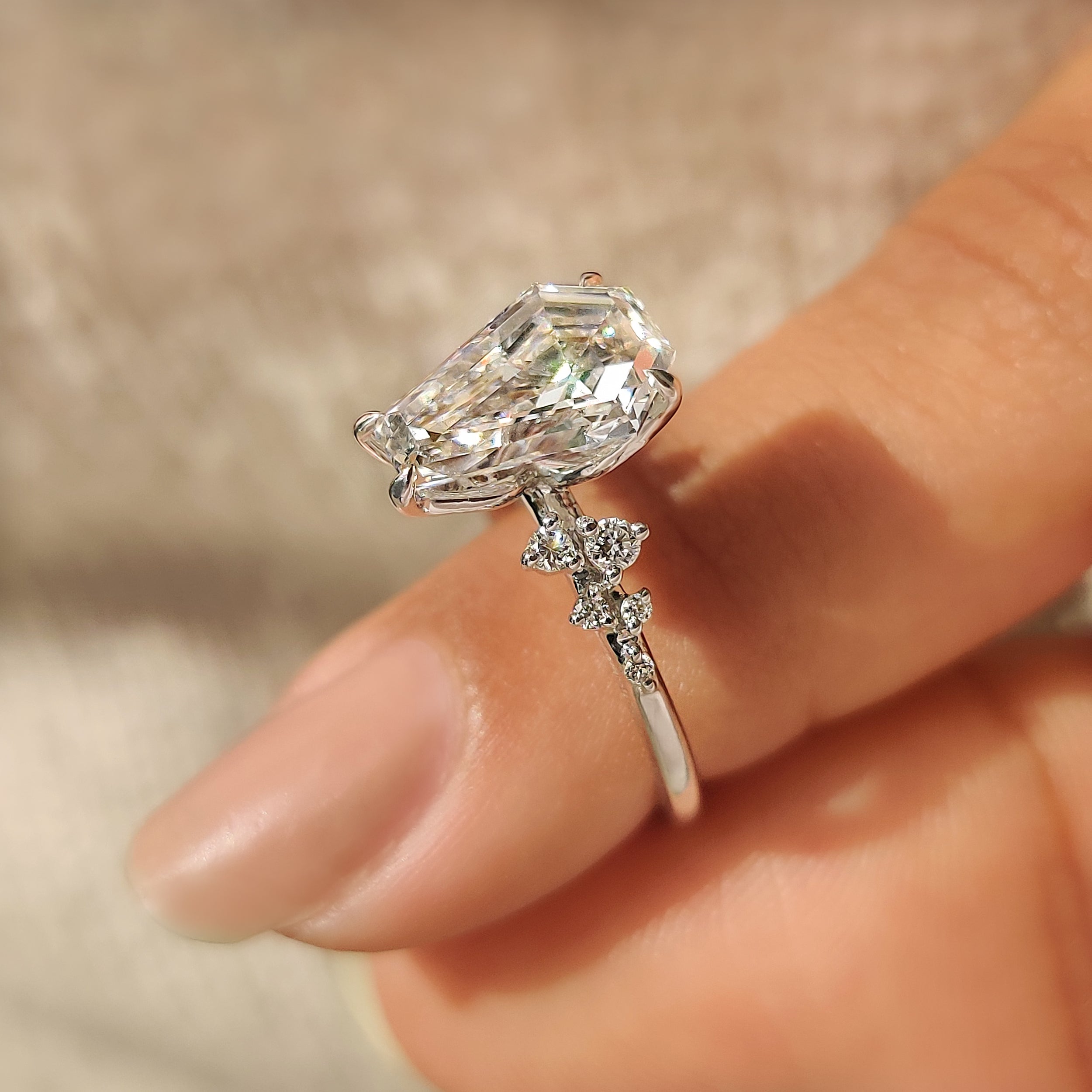 Coffin cut engagement ring with hidden diamonds and accents
