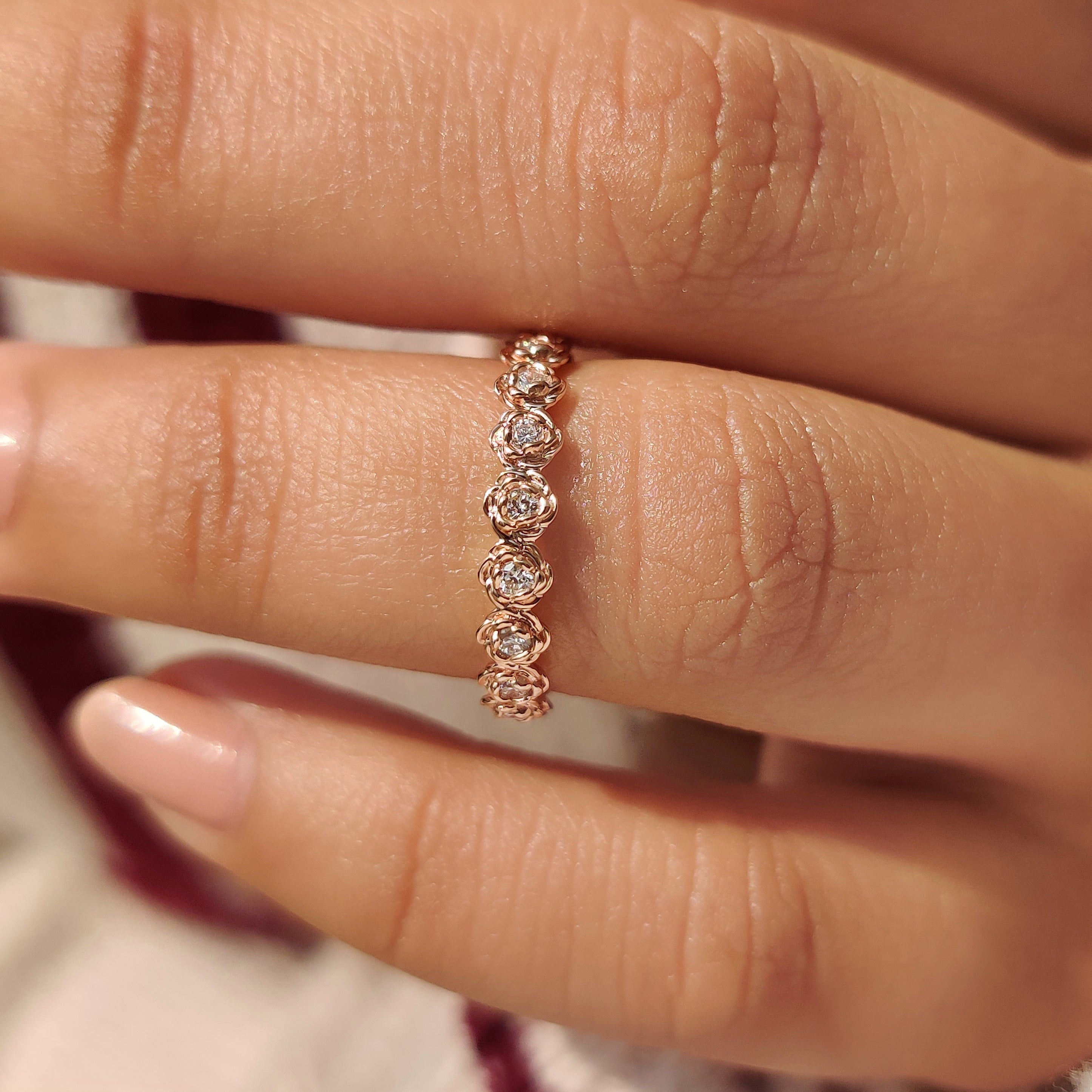 Lab grown diamond band with nature inspired floral style.
