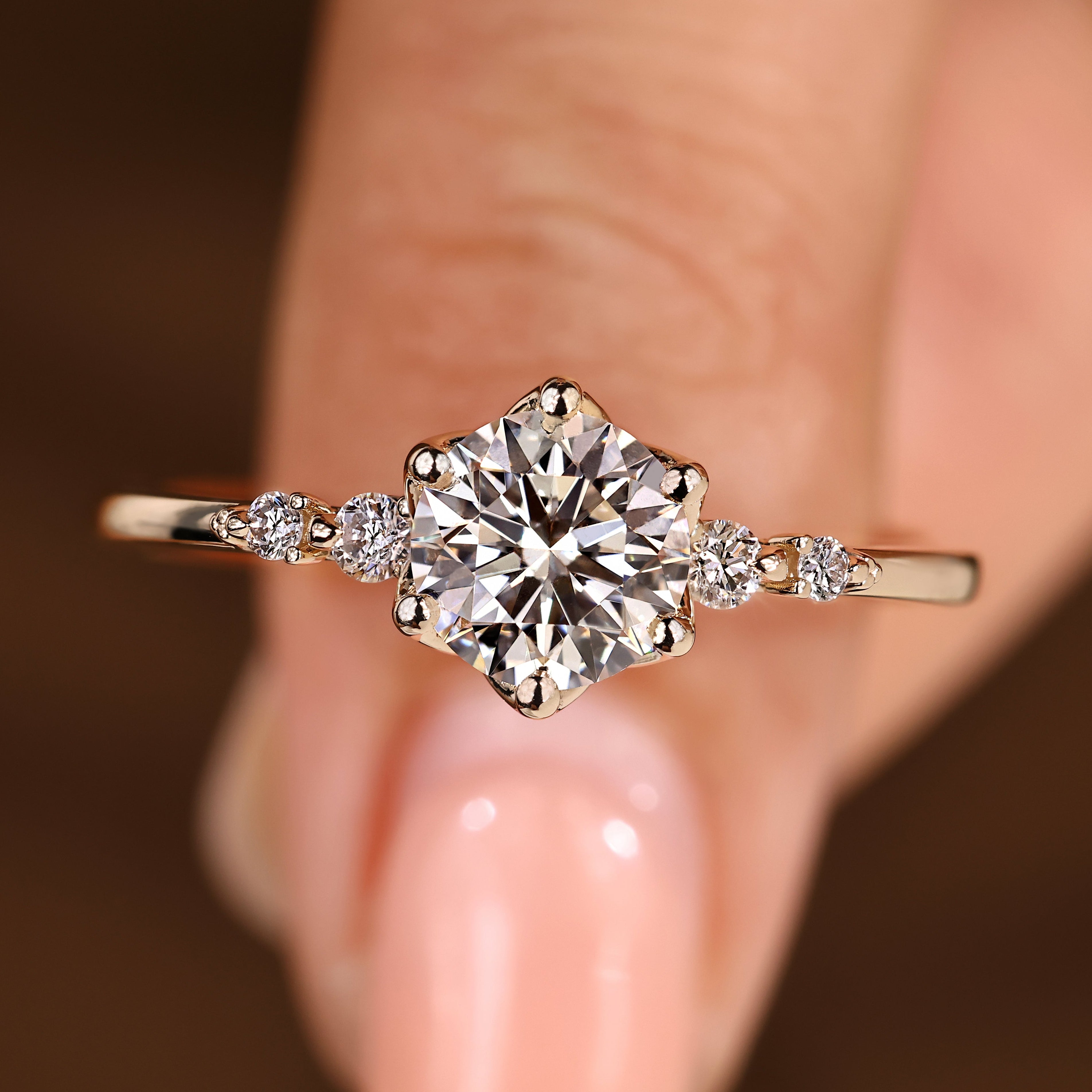 Round cut diamond ring with round side stones design
