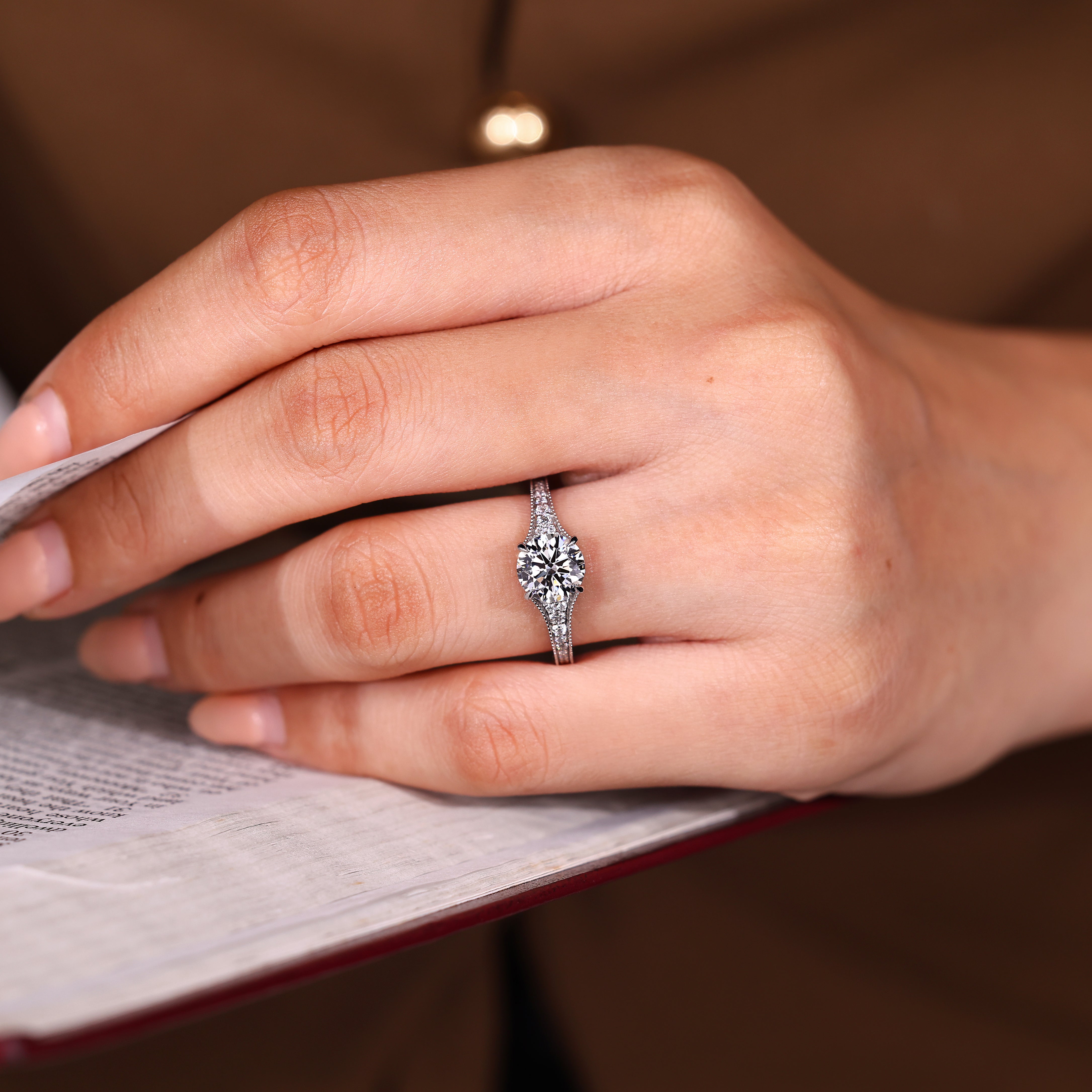 Handmade round diamond ring with pave setting
