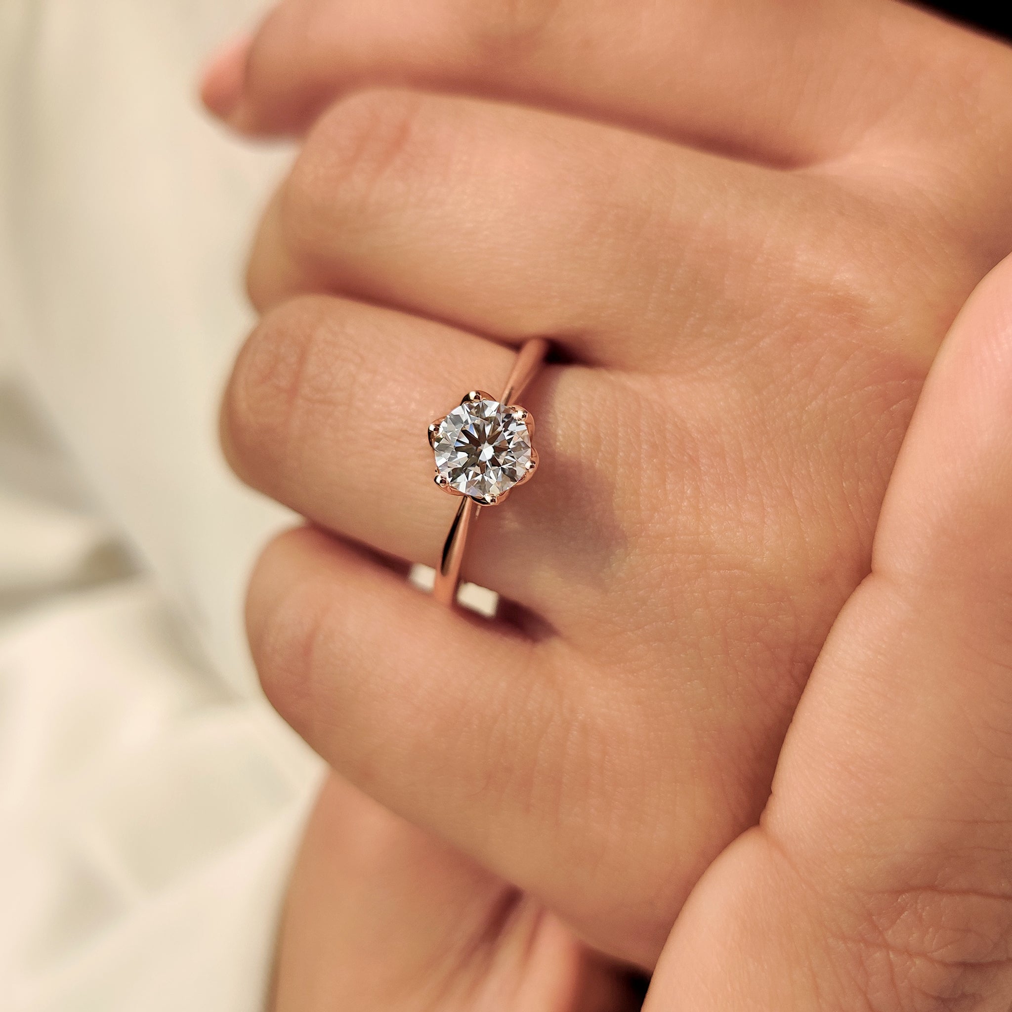 Round cut ring with hidden sapphire accent.
