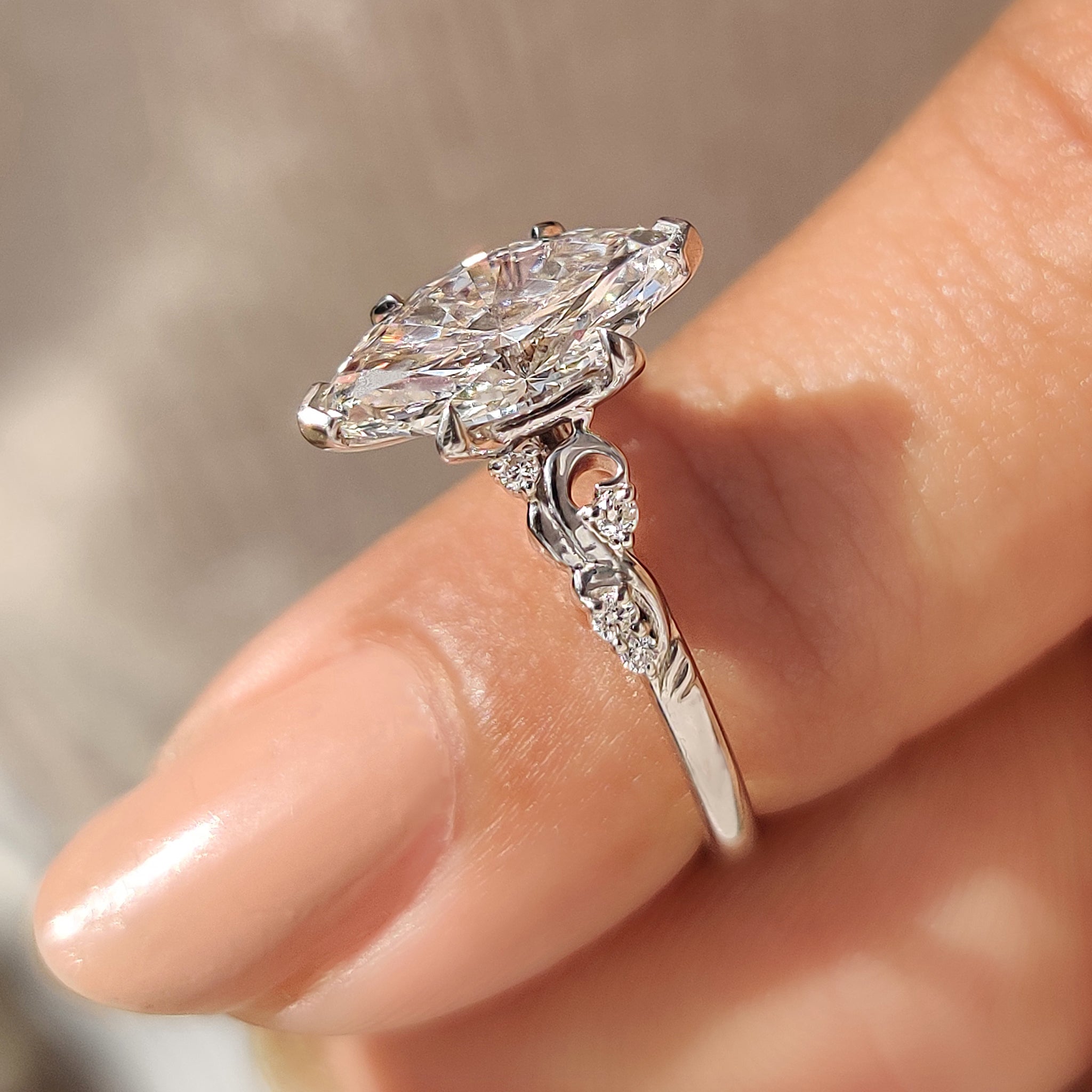 Handmade marquise cut ring with vintage inspired side stones
