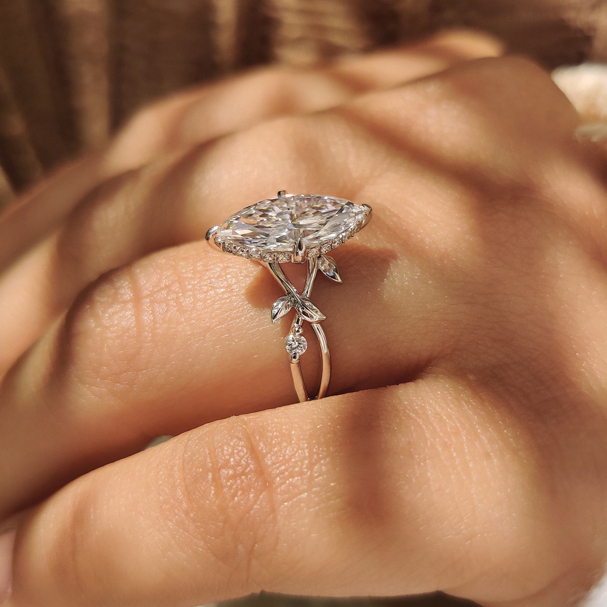 Lab grown marquise diamond ring with nature inspired style.
