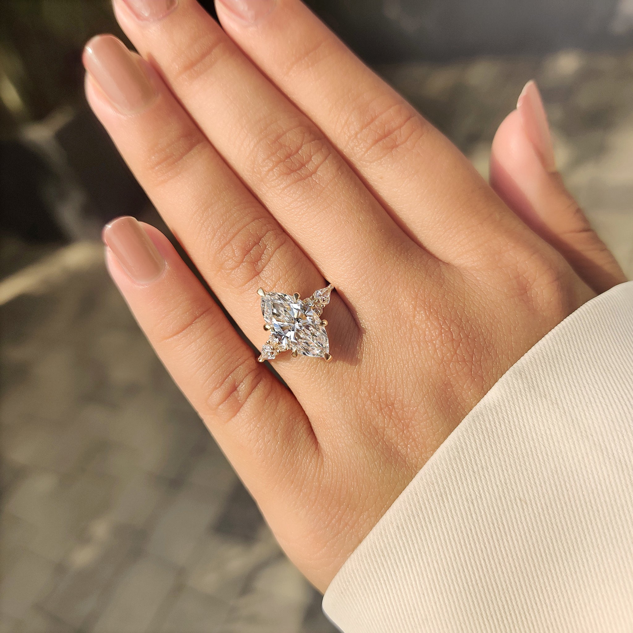 Muse setting marquise ring with kite stones.
