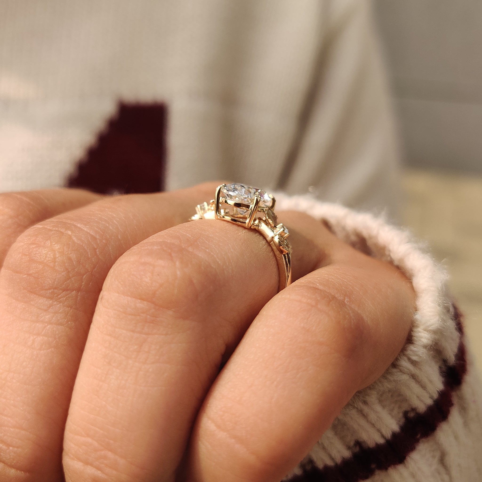 Nature inspired oval diamond ring with detailed prongs
