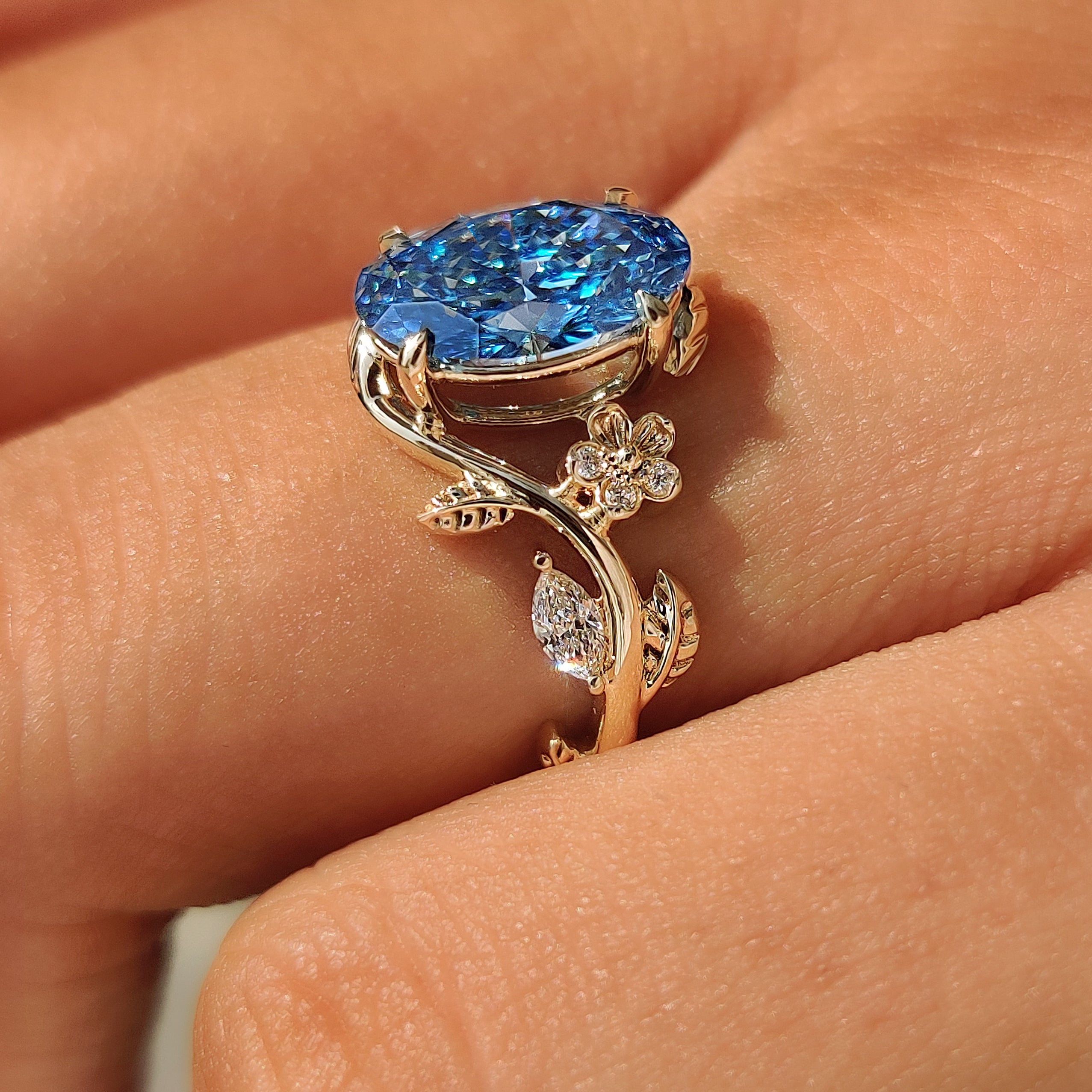 Oak leaf and acorn shank design on solitaire ring.
