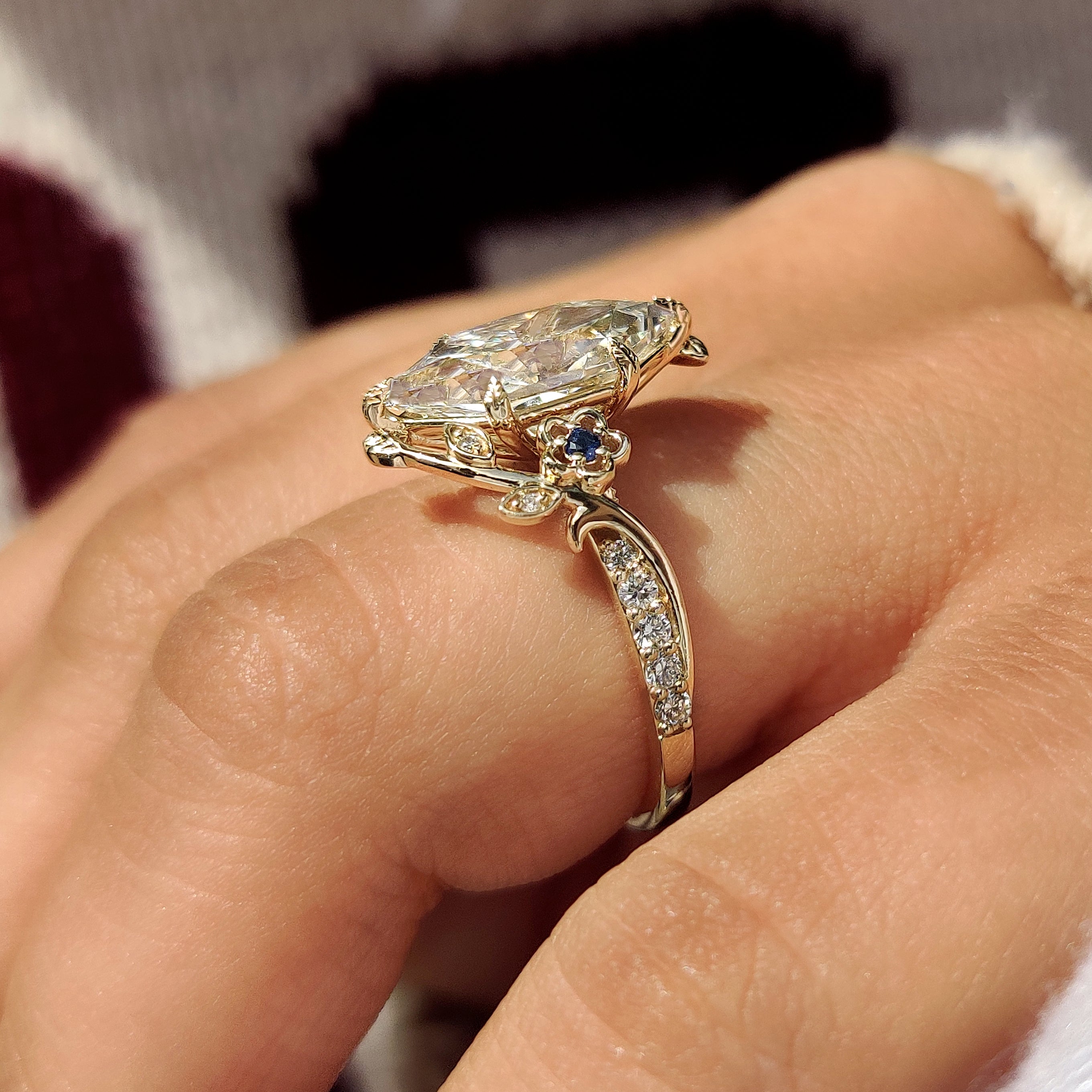 Handmade dutch marquise ring with blue sapphire accents
