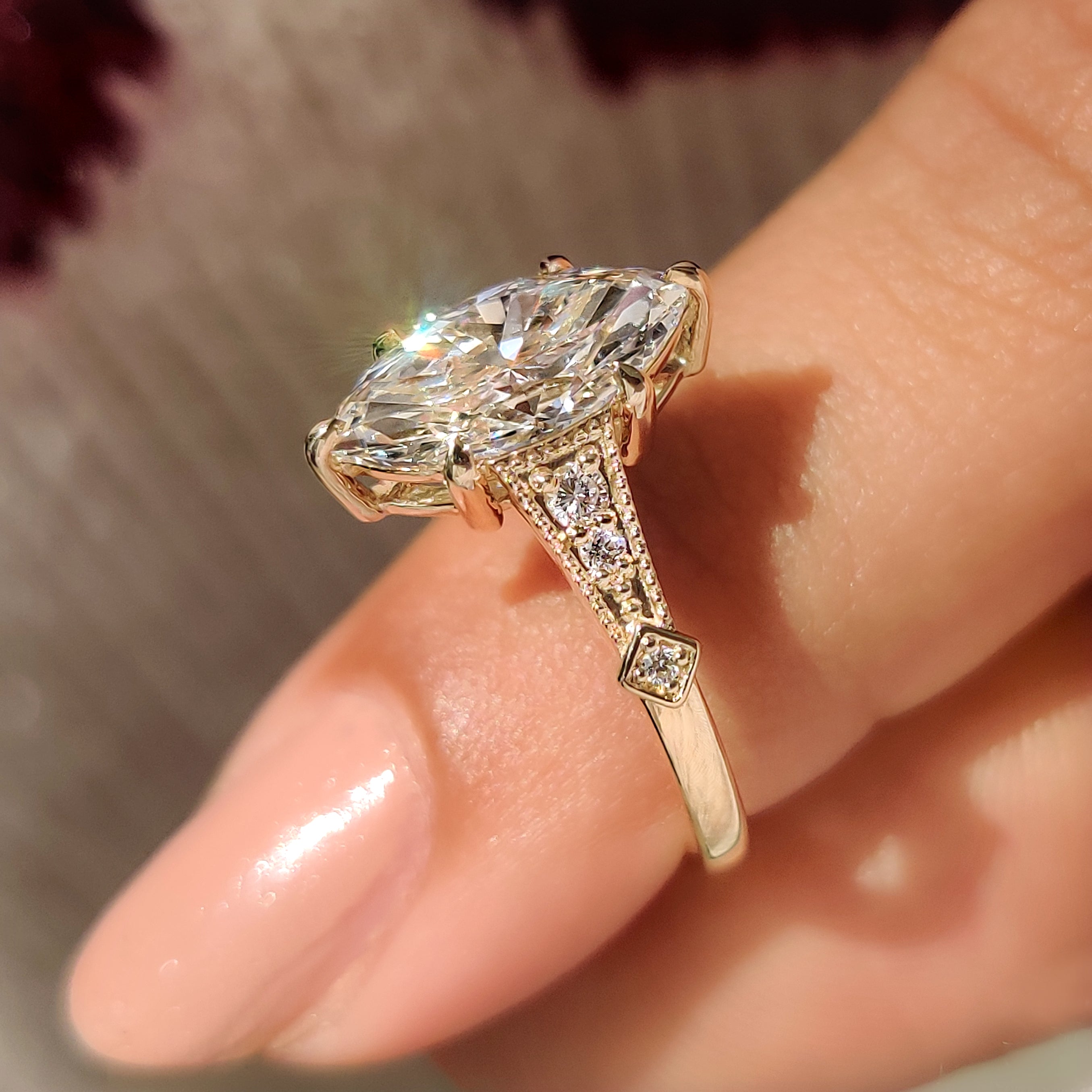 Vintage marquise diamond ring with milgrain and claw prongs.
