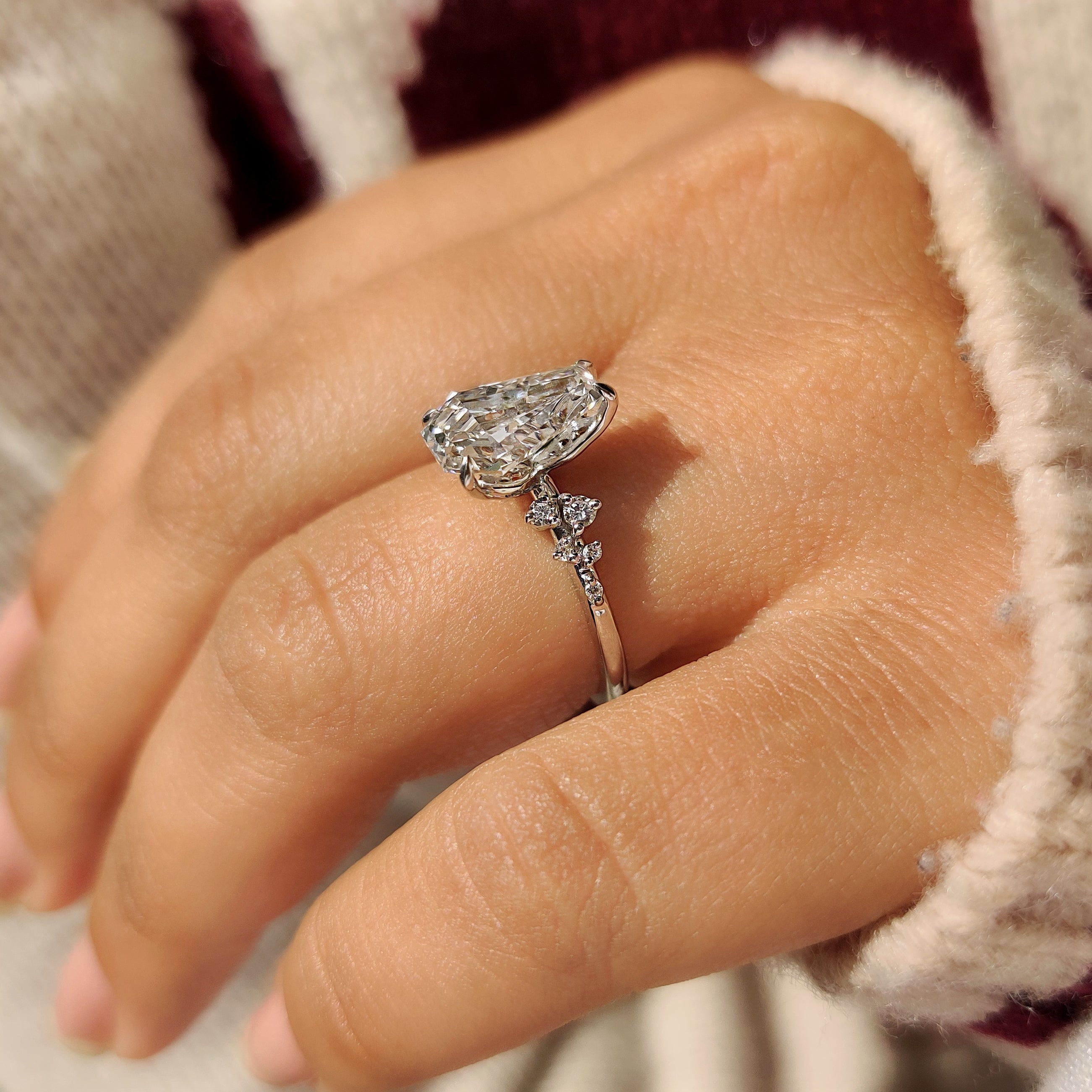 Coffin lab grown diamond ring with round accent stones
