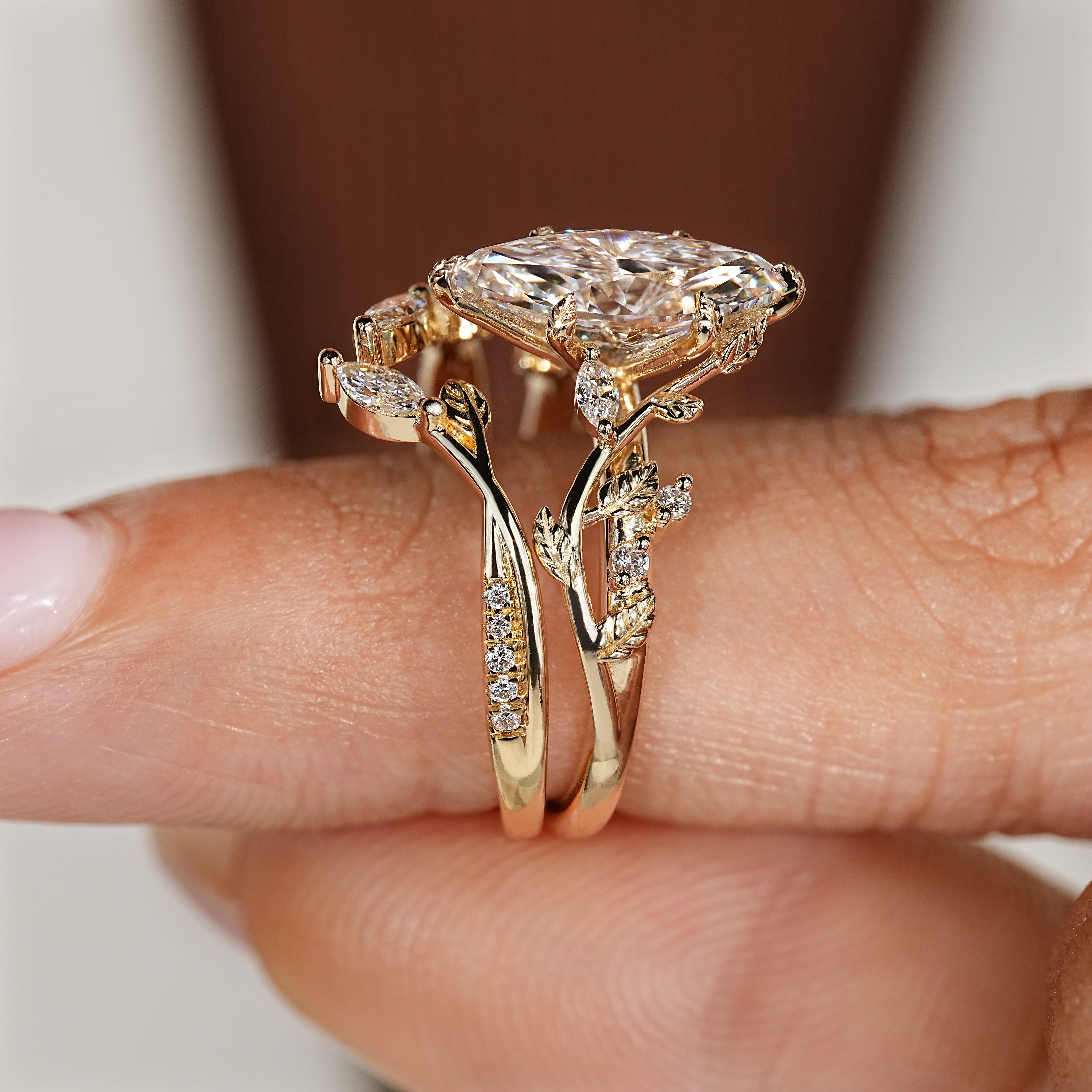 Marquise center diamond with marquise and round side stones
