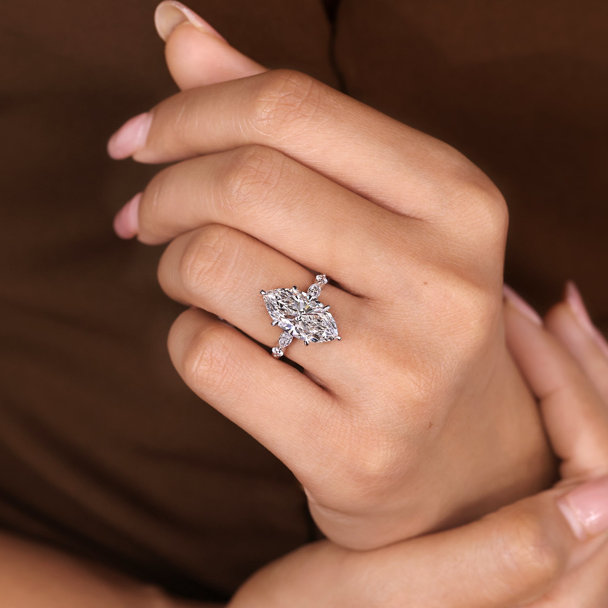 Marquise diamond ring with secure six claw prong setting
