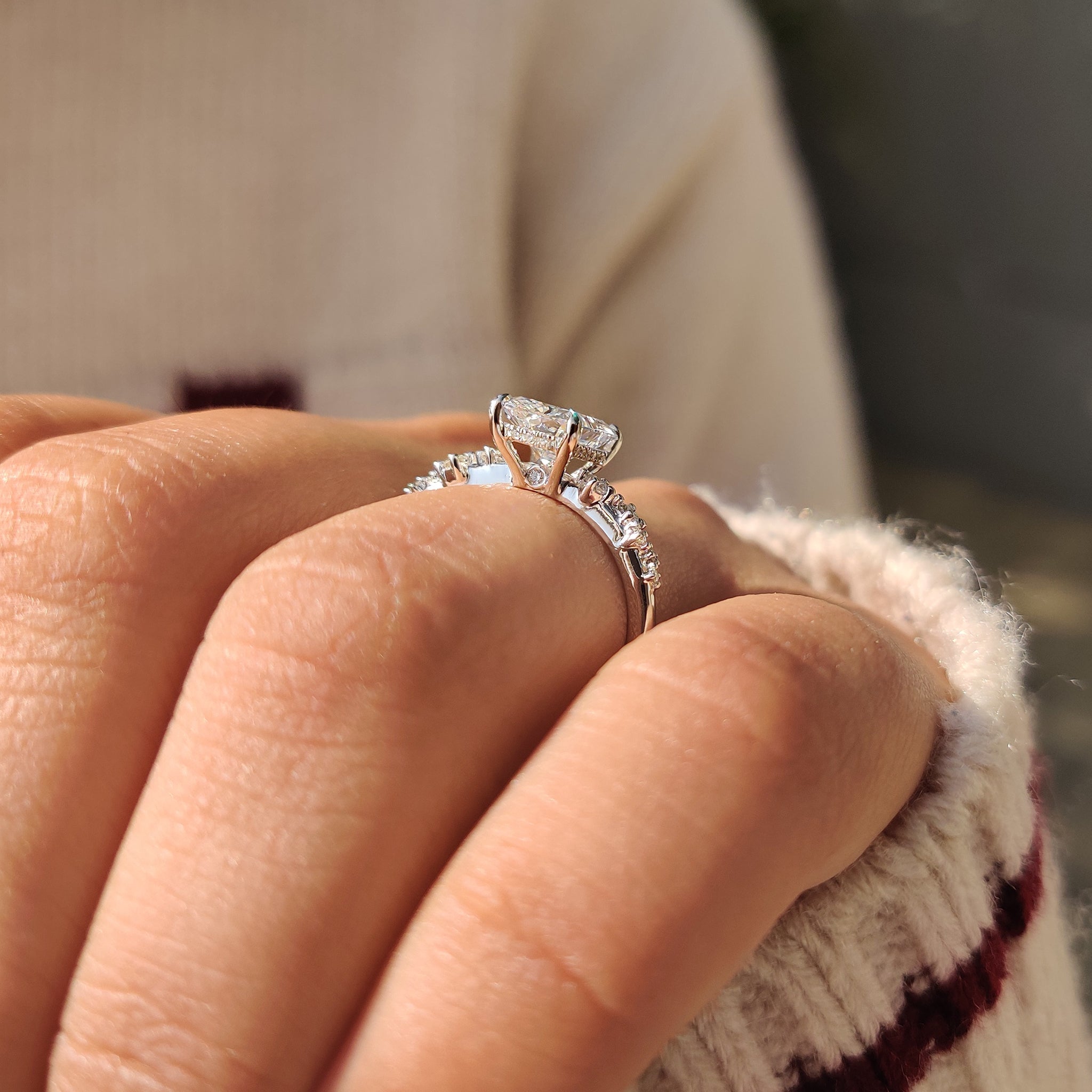 Radiant cut diamond ring with modern hidden halo look.
