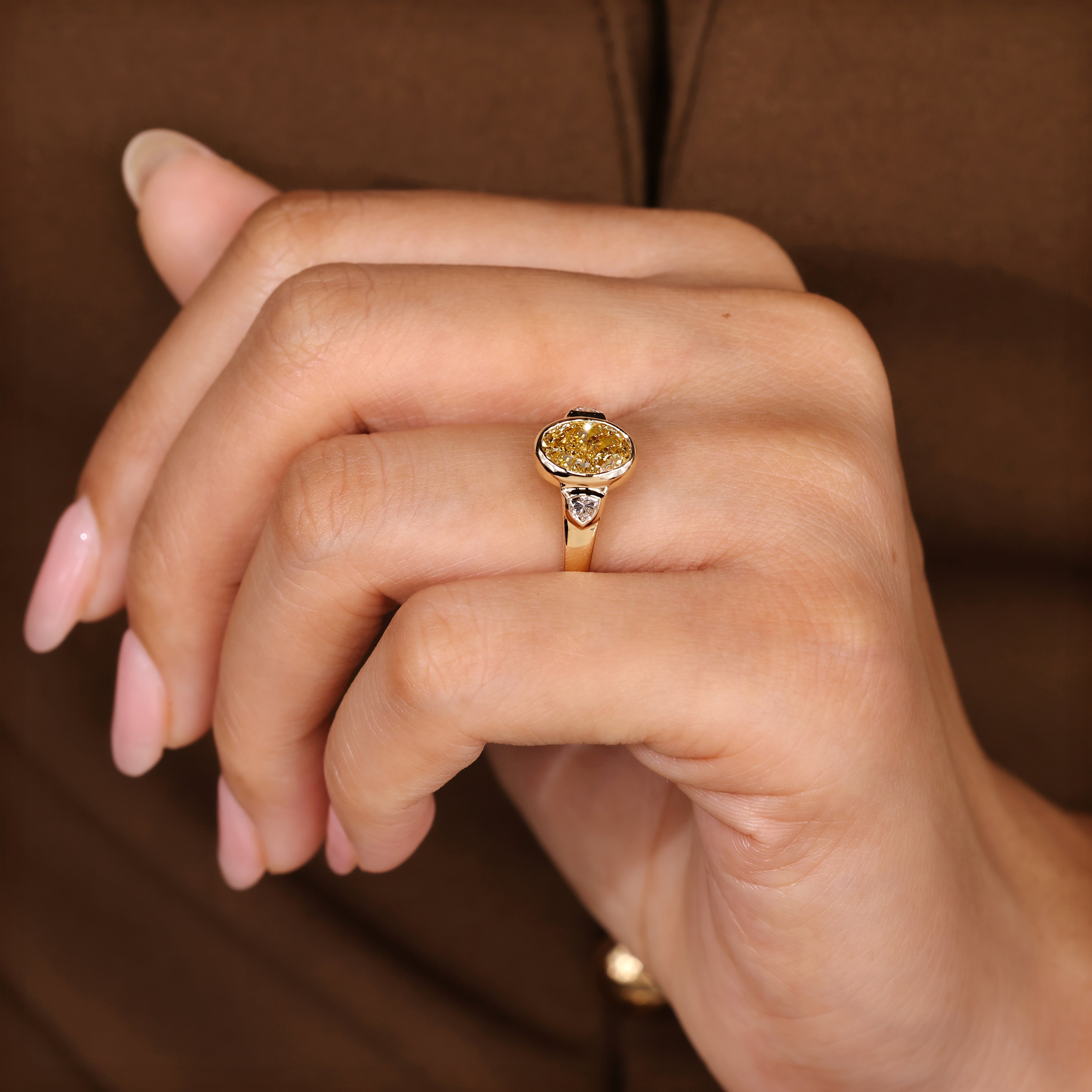 Lab grown oval diamond ring with tapered shank design
