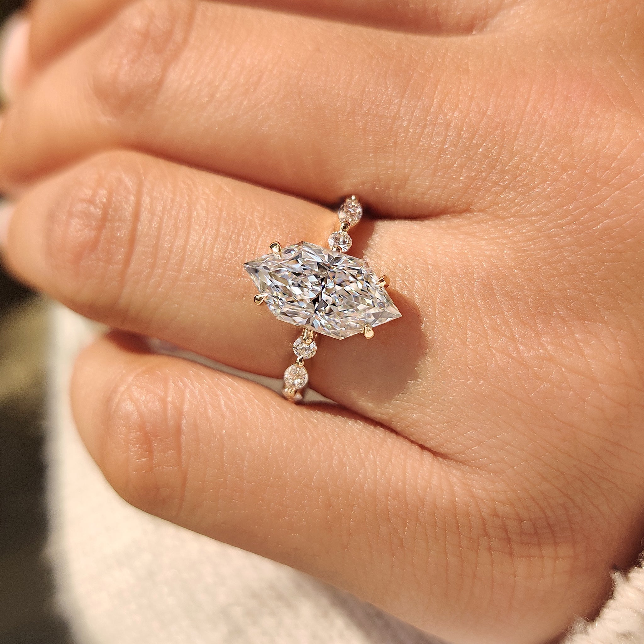 Shared prong pave dutch marquise engagement ring design.

