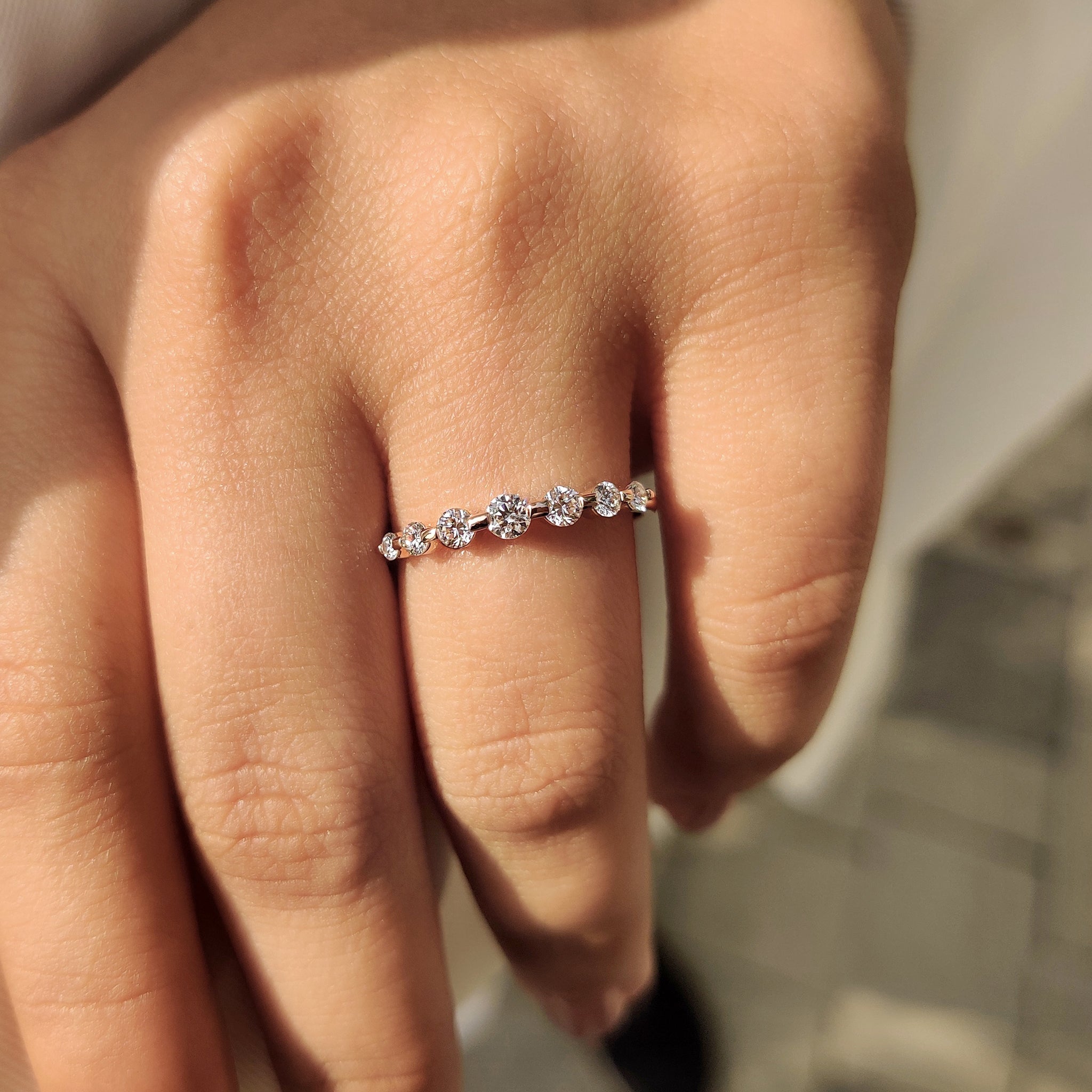 Handmade half eternity band with round lab grown diamonds.
