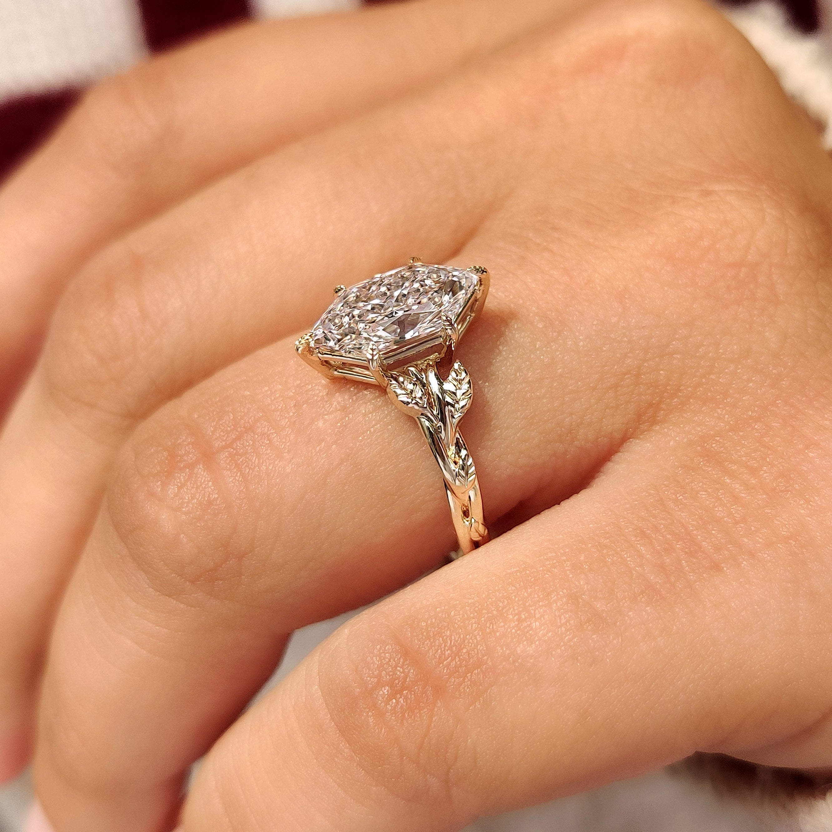 Solitaire Dutch marquise ring with leaf details
