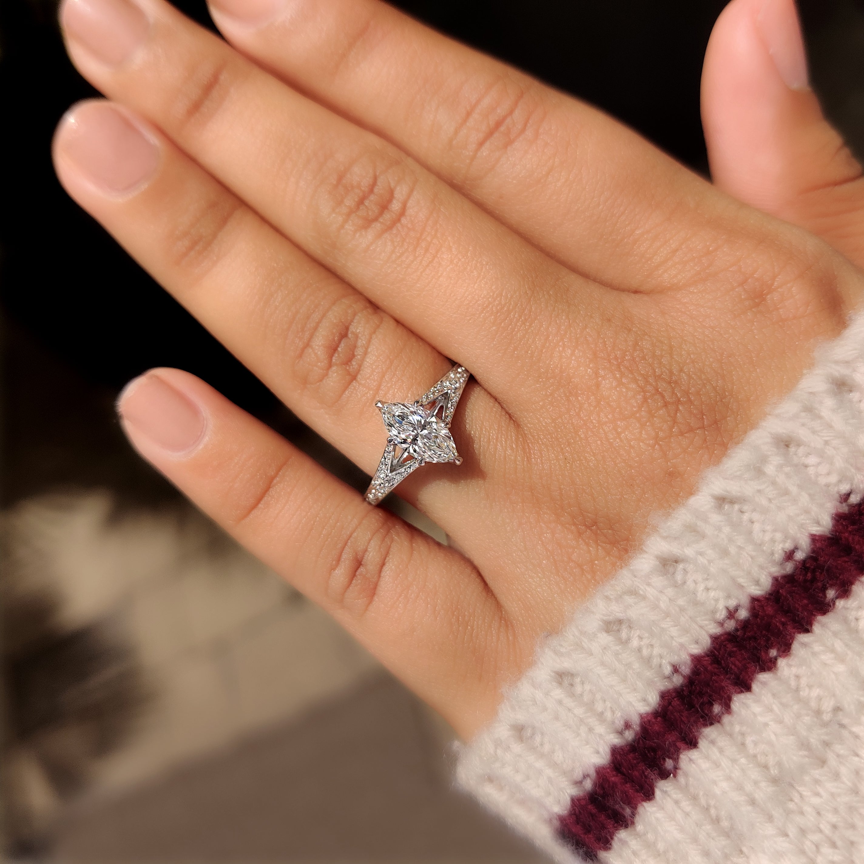 IGI certified marquise ring with vintage style details.
